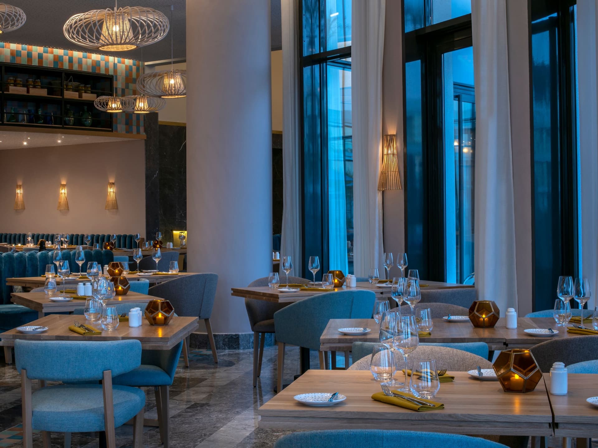 Restaurant interior setup with a luxurious centerpiece, creating a warm and  inviting atmosphere.