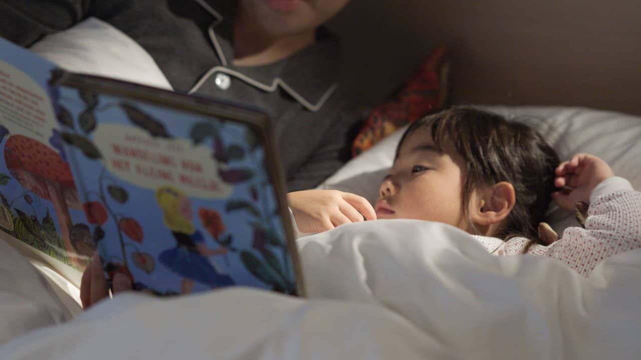 Hyatt House Kanazawa Girl Reading In Bed