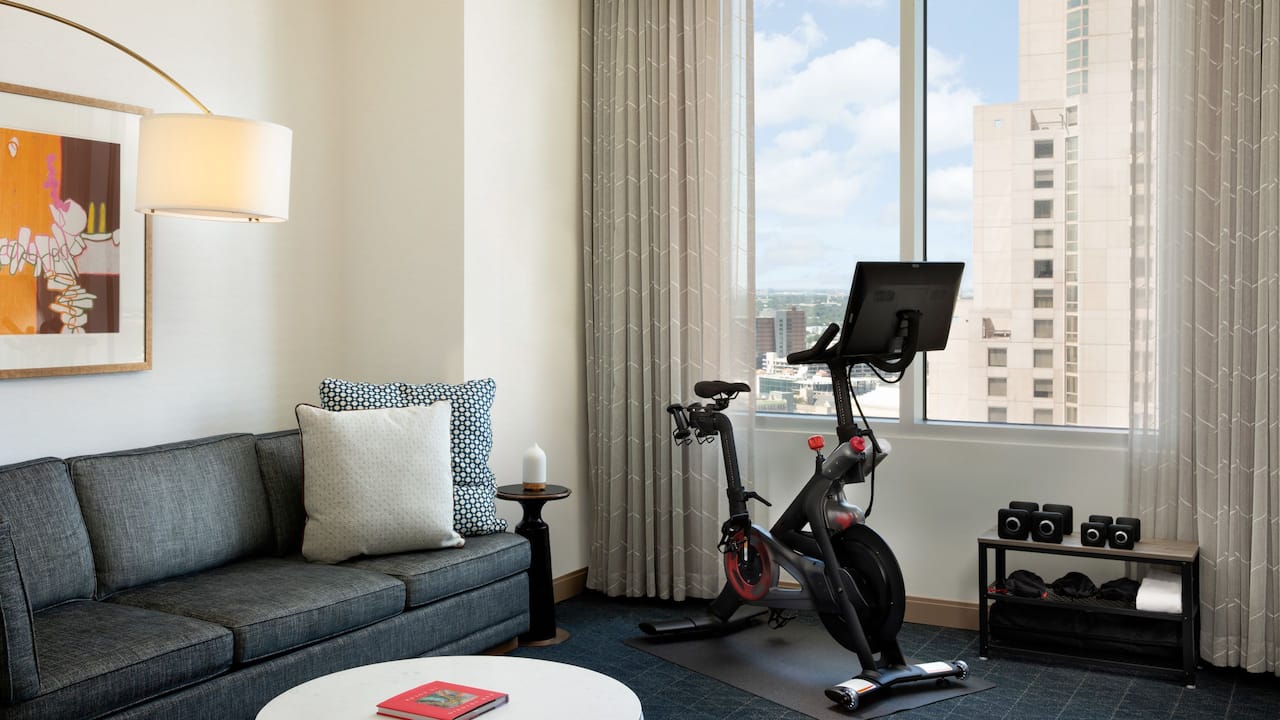 Wellbeing Suite with Peloton Bike in living room area
