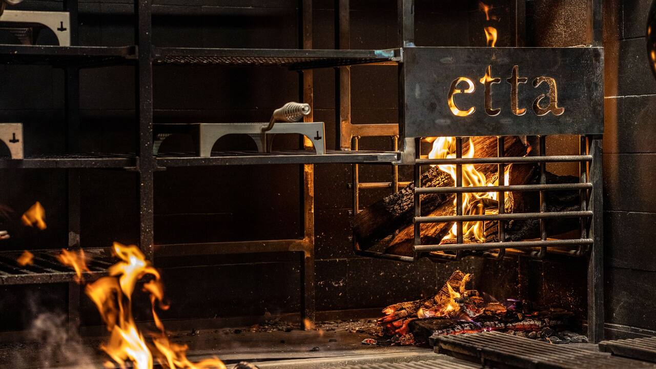 etta restaurant wood fire grilling area