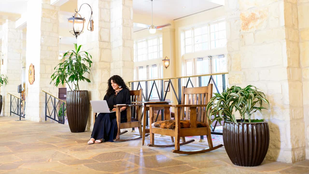 Woman Working in Lobby