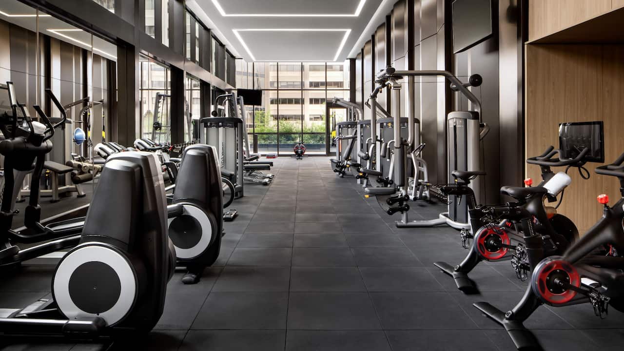 A spacious fitness center located inside Park Hyatt Toronto