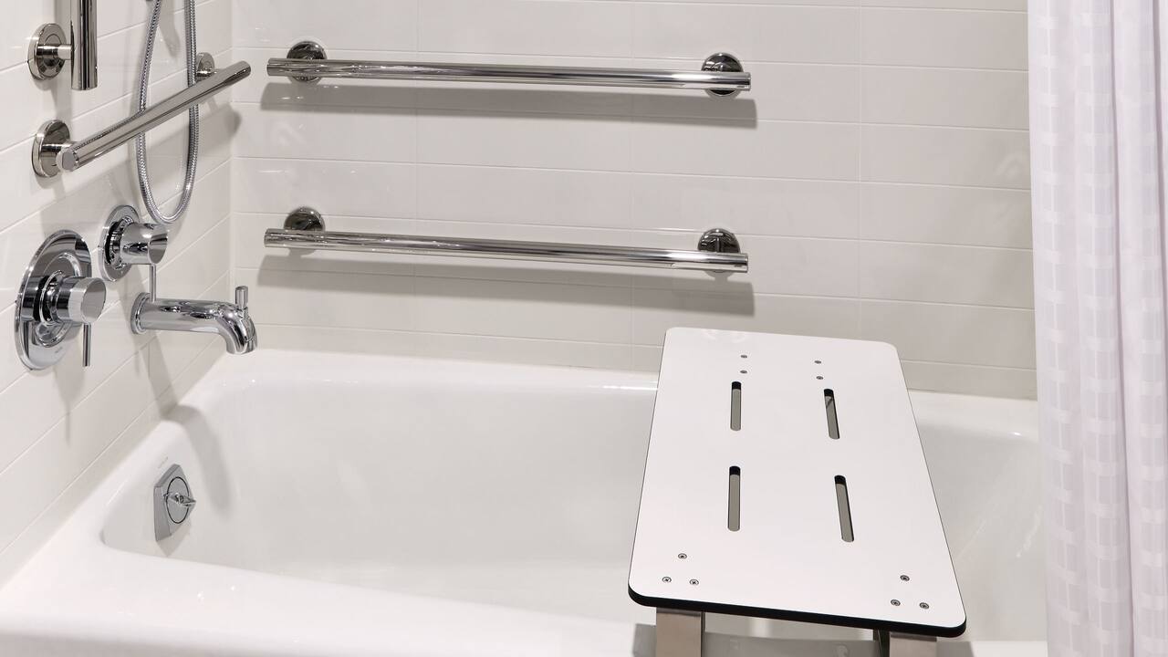 Accessible guestroom bathroom with ADA bathtub