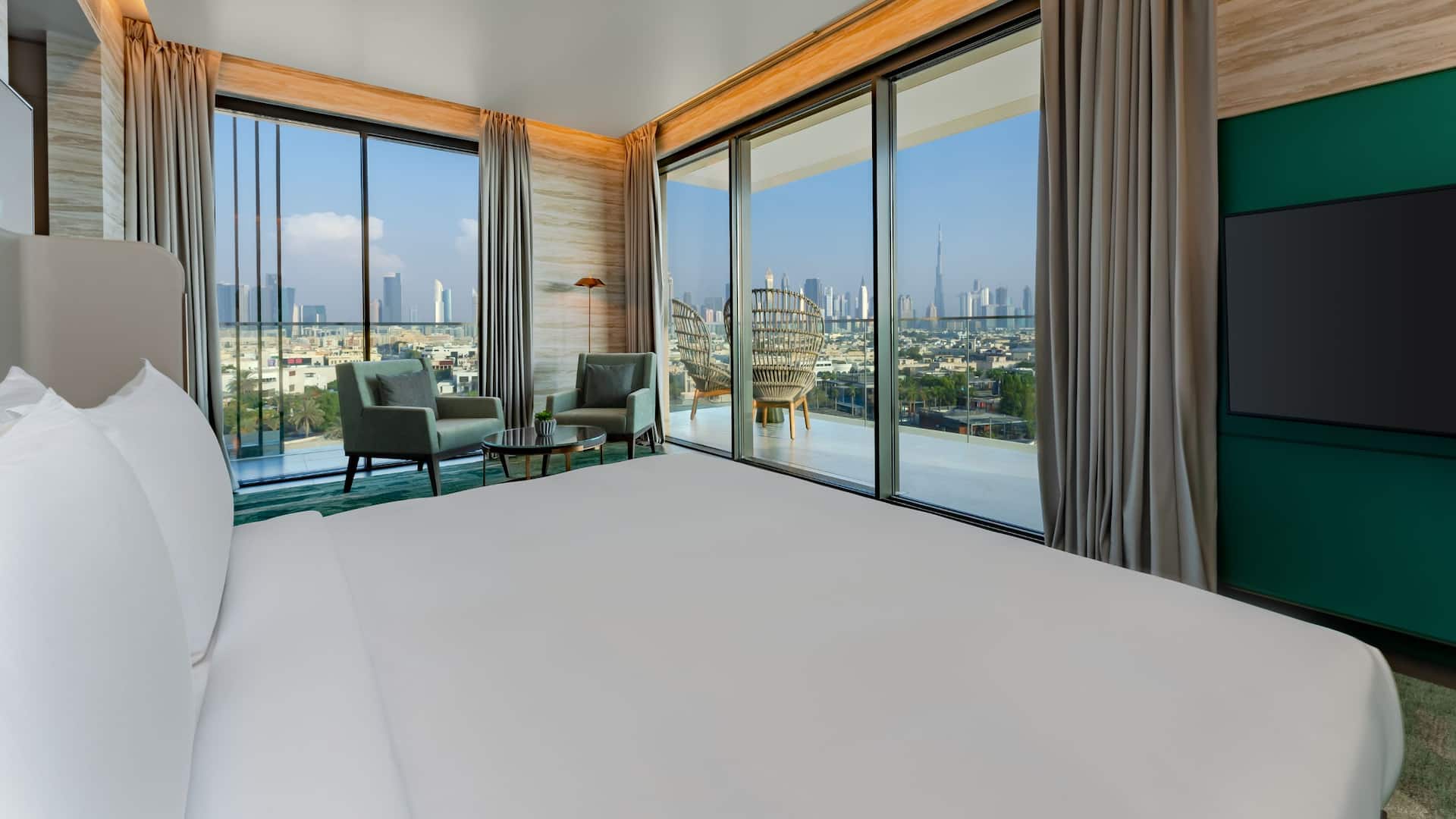 1 из 7 Hyatt Centric Jumeirah Dubai Executive Hotel Suite Bedroom offering views of Dubai skyline and the Arabian Gulf