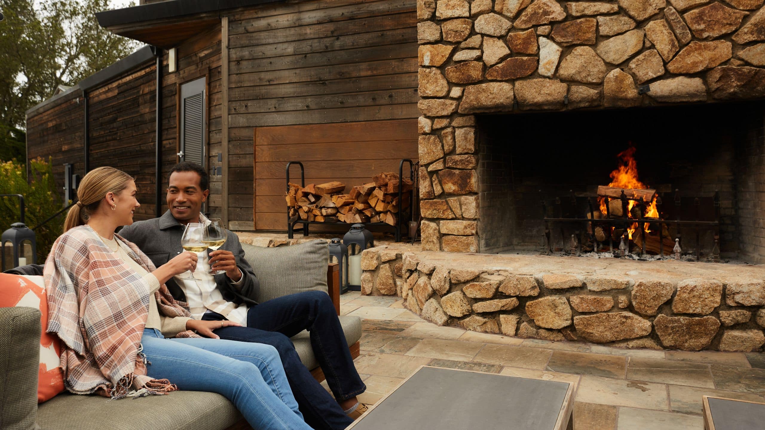 Alila Ventana Big Sur Couple Drinks Fireside