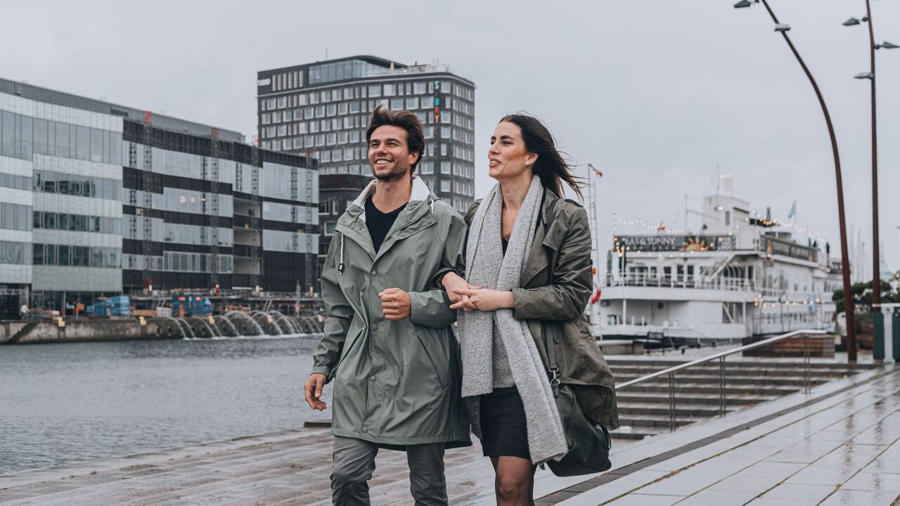 People walking along the water in Malmö