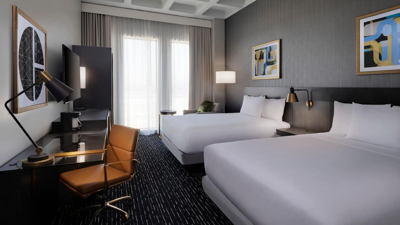 Two Queen Beds guestroom with spacious workspace