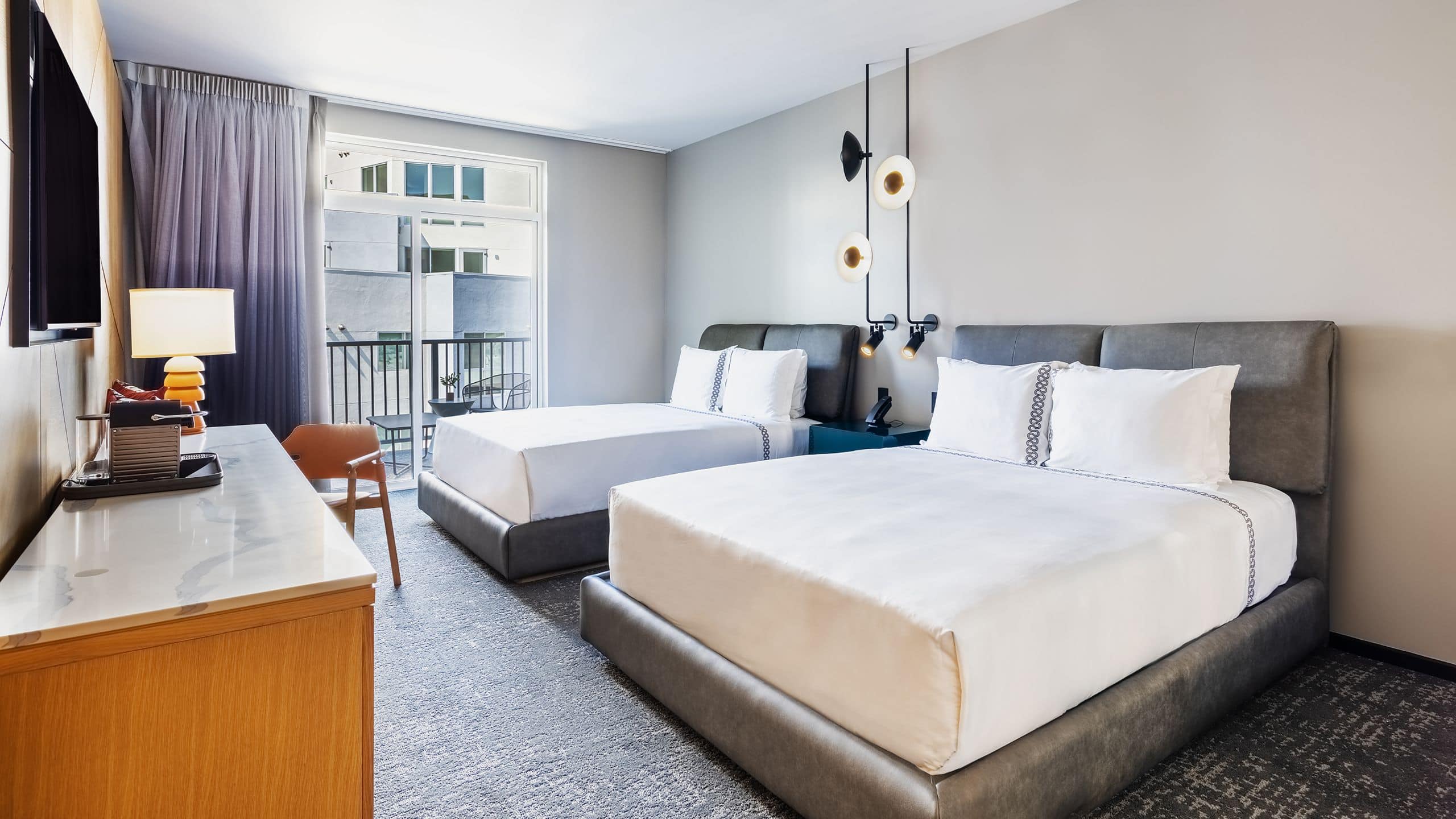 The Shay Double Queen Balcony Bedroom
