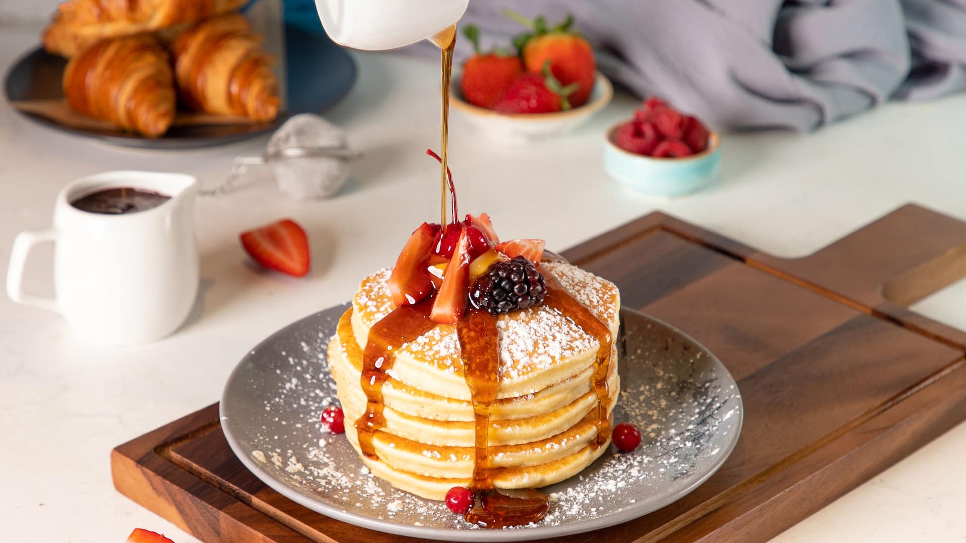 Hyatt Place Dubai Jumeirah Pancakes Topped With Fruits And Syrup