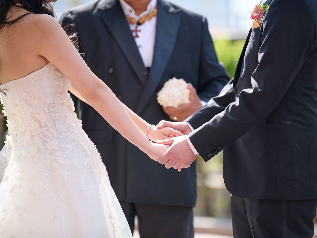 Wedding Couple Holding Hands