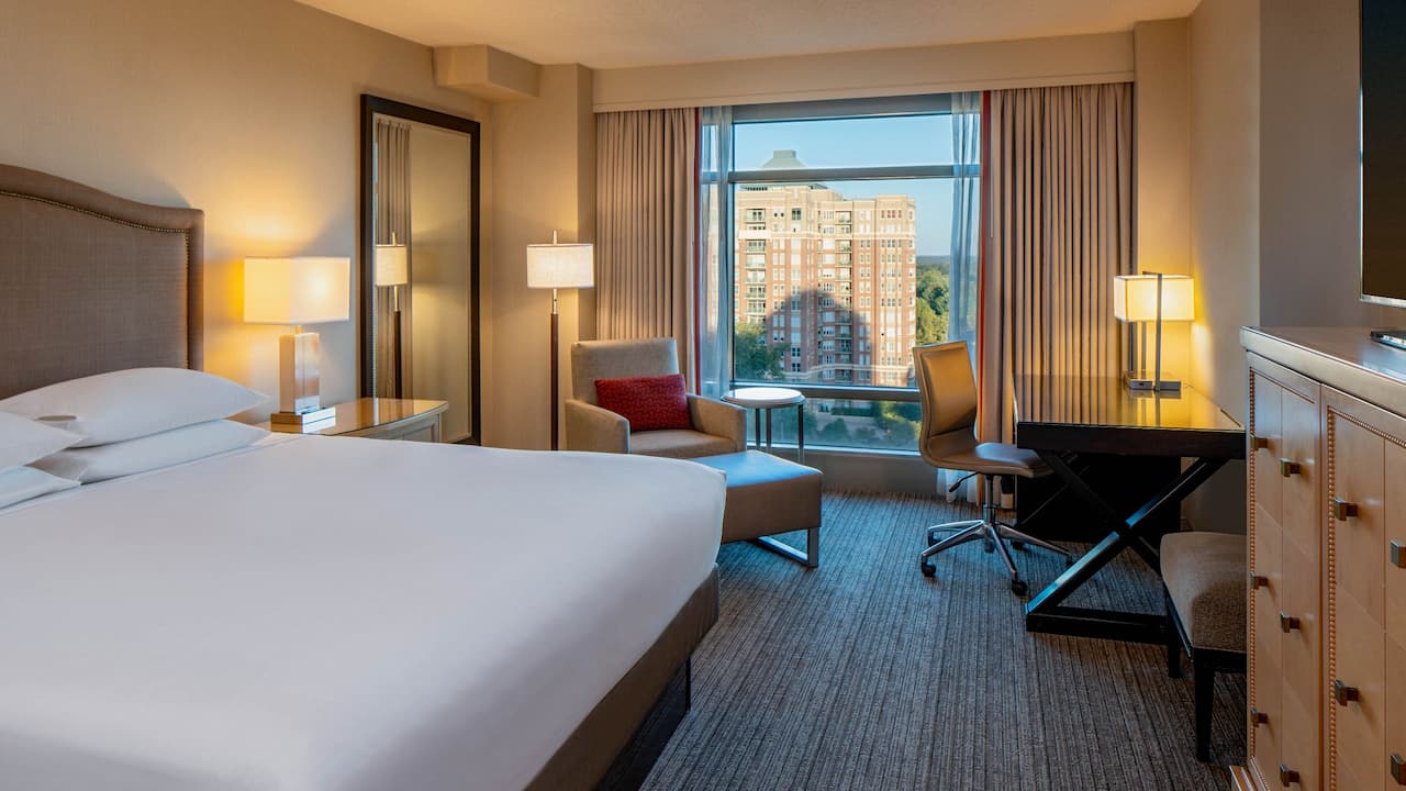Room with Kingbed and armchair at Hyatt Regency Reston 
