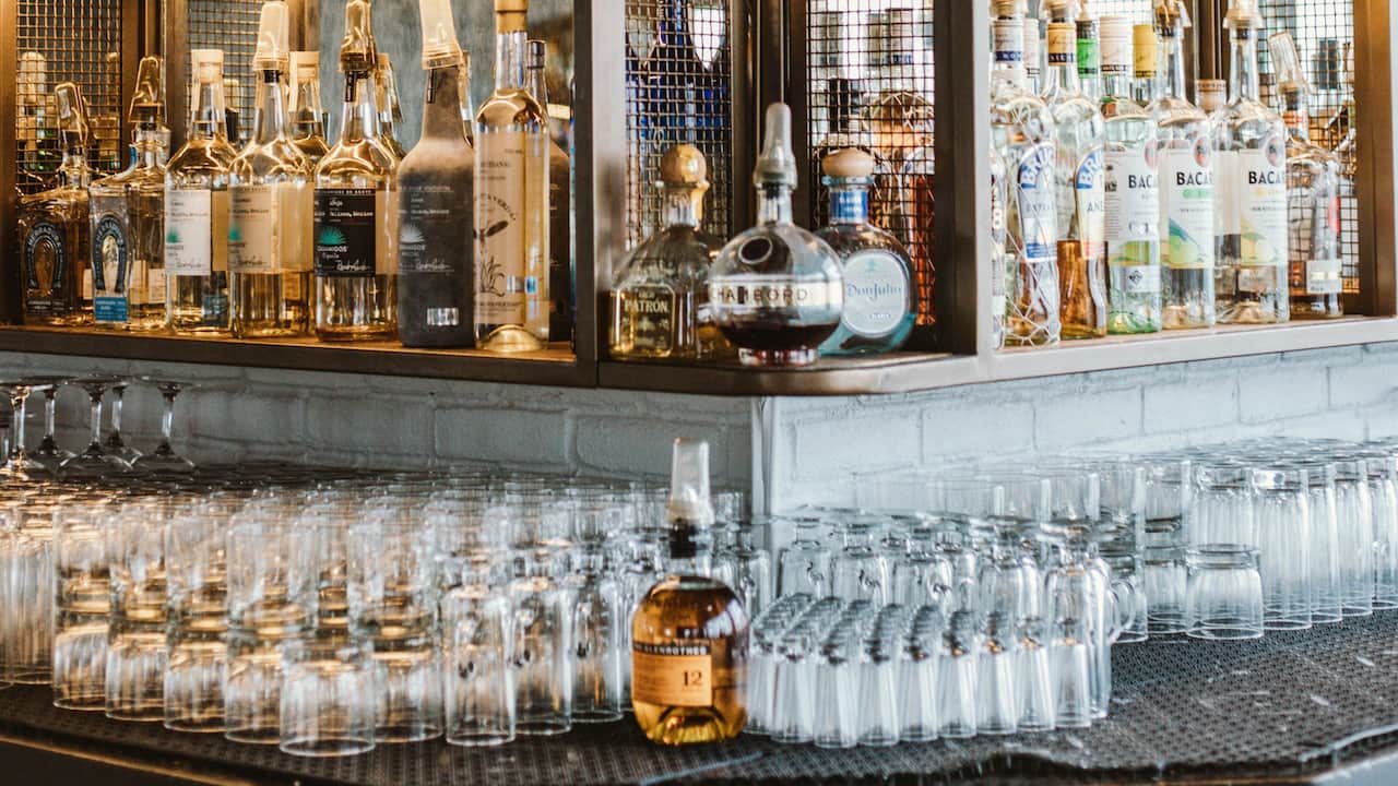Crown Bar with liquor bottles and glassware