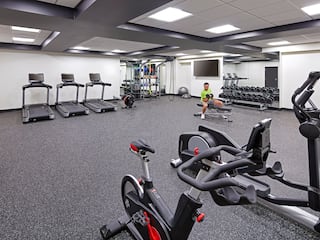Hyatt Centric Downtown Sacramento Fitness Center Guest With Weights