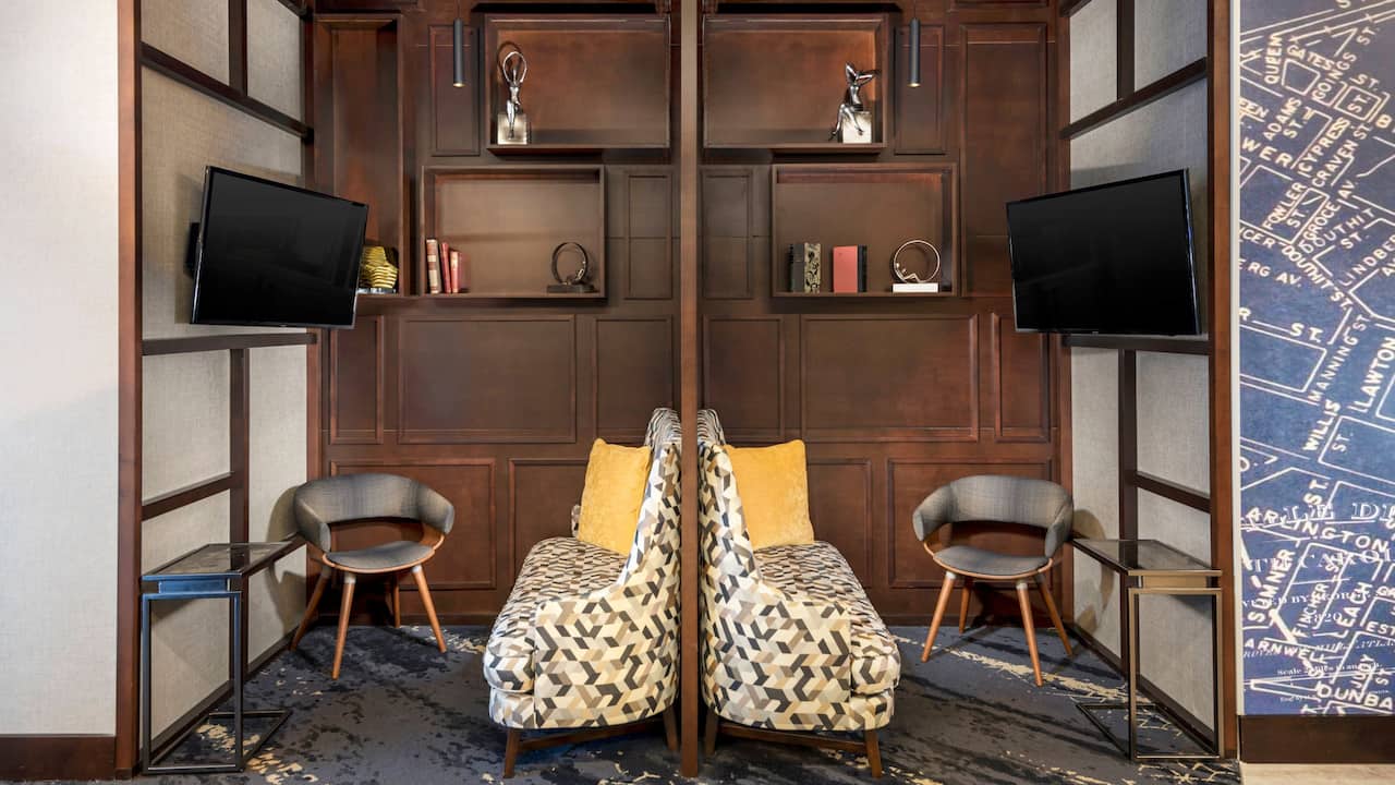 TV Seating & Work Pod Area in the Lobby
