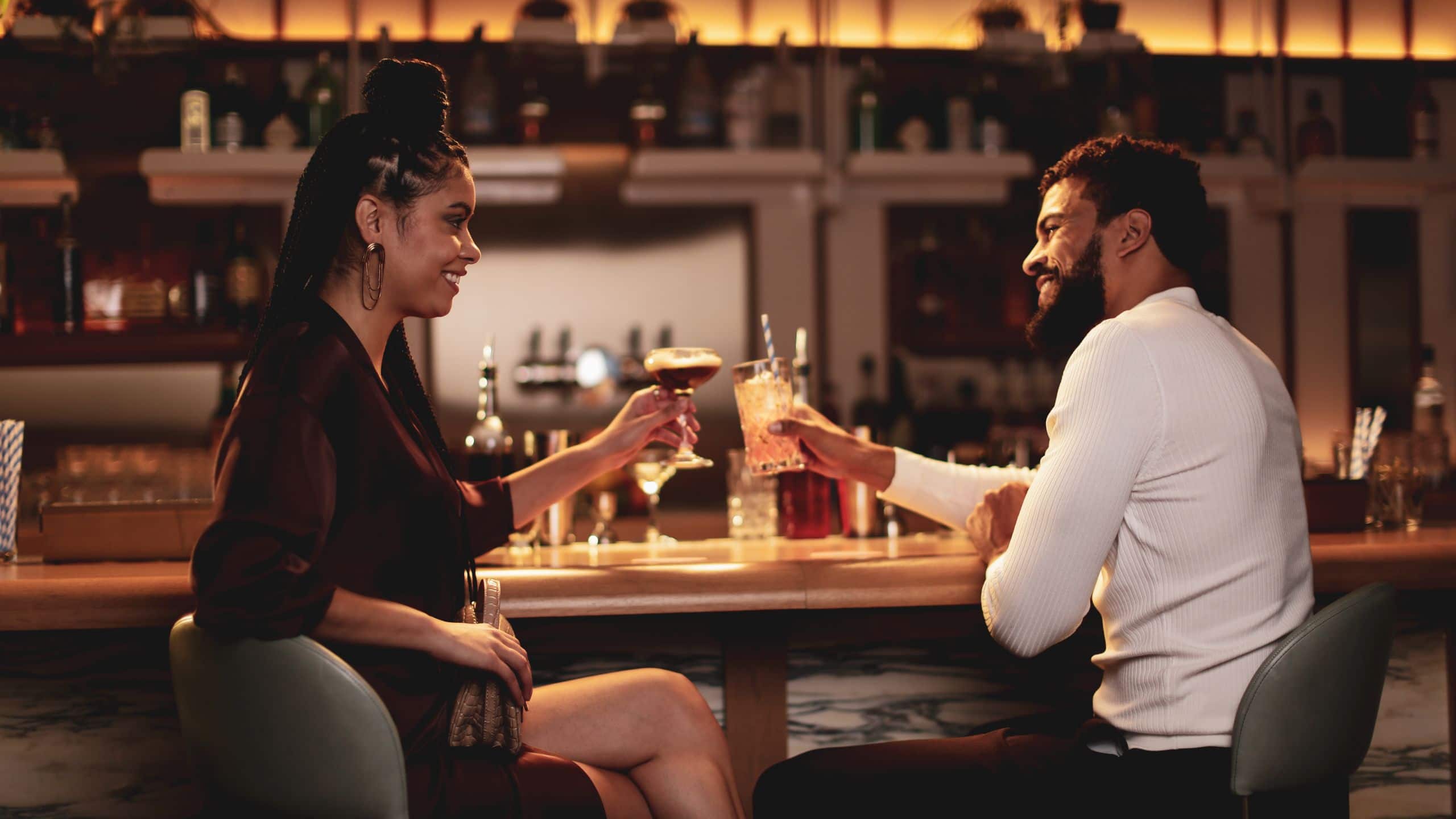 Thompson Washington D.C. Couple Cheers Cocktails