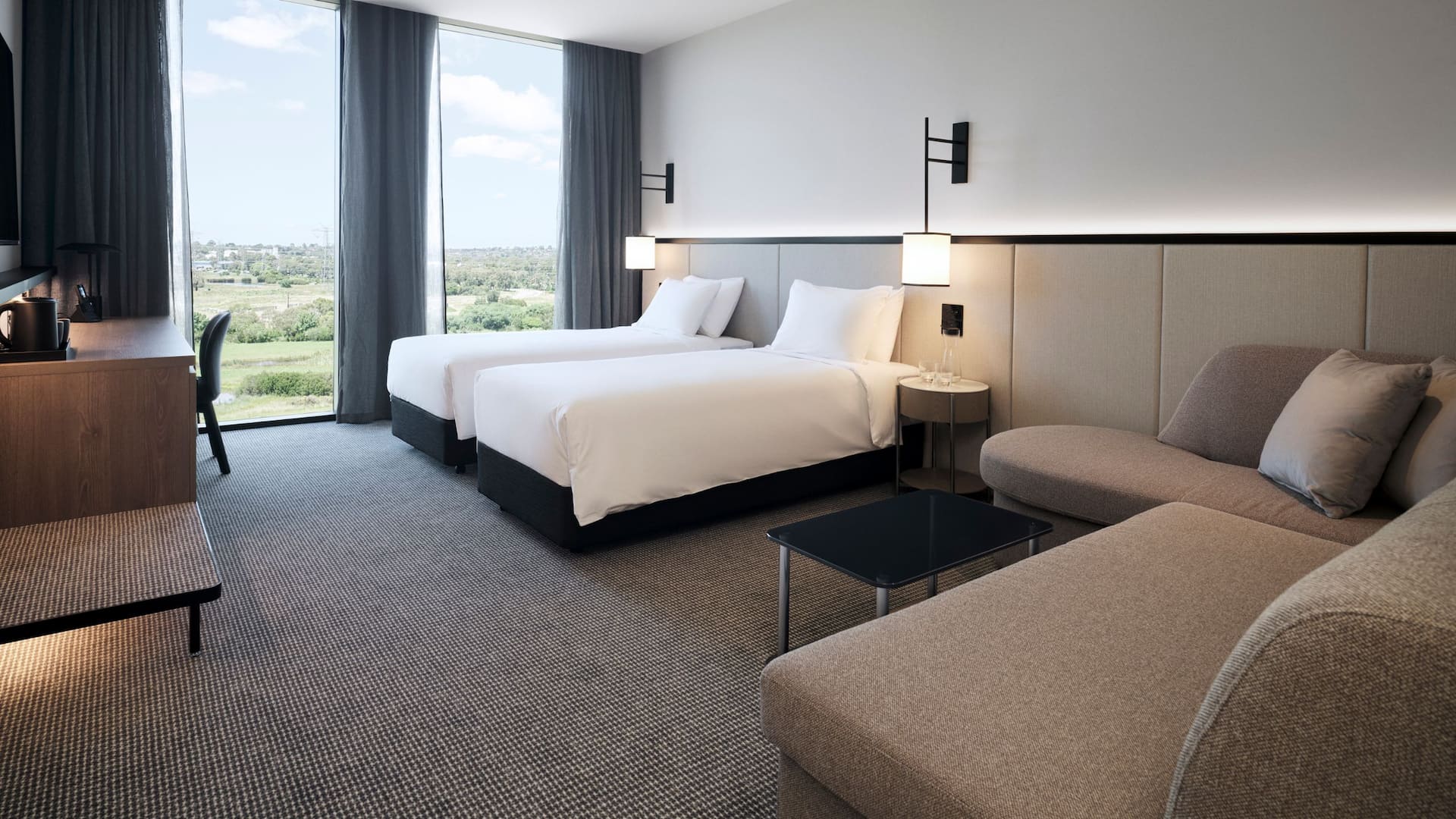 Hyatt Place Melbourne Caribbean Park Twin Guestroom Sofa