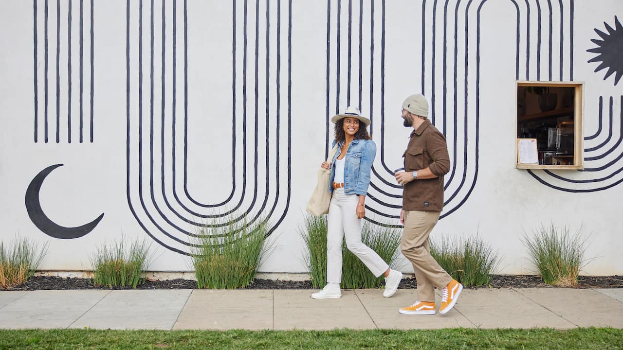 Risingco Exterior Mural Couple