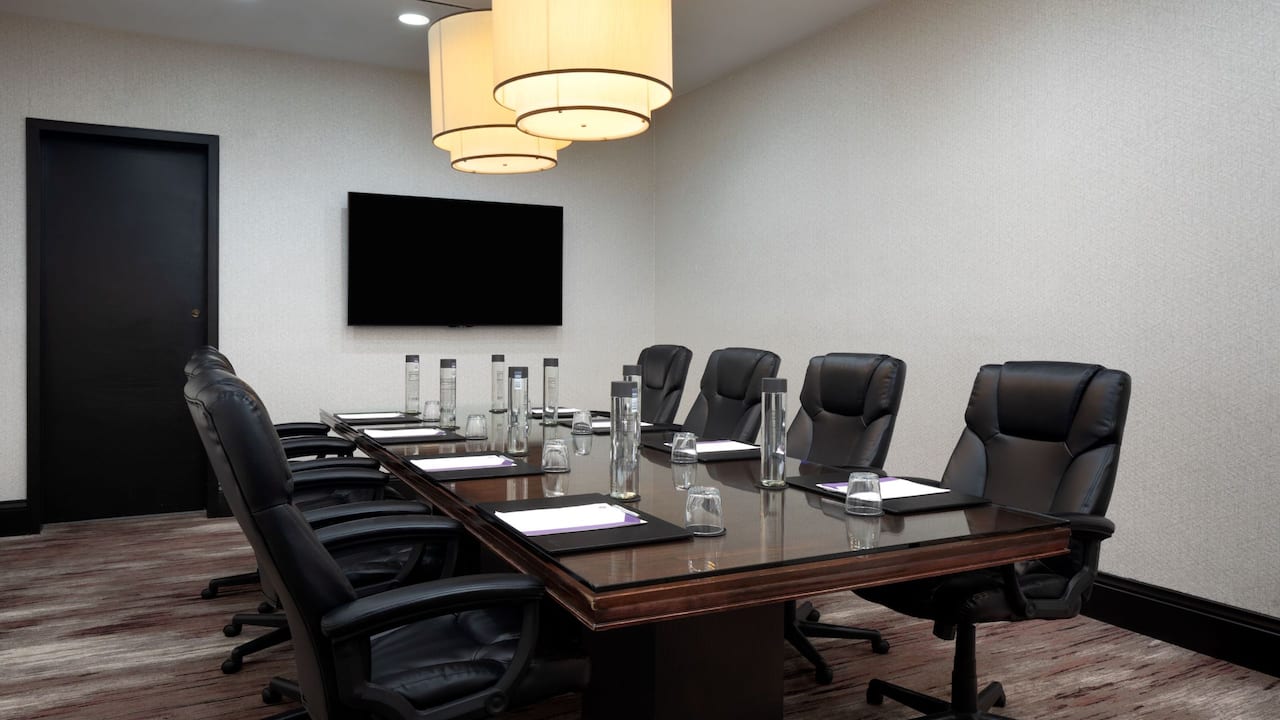 Permian boardroom with large conference table 