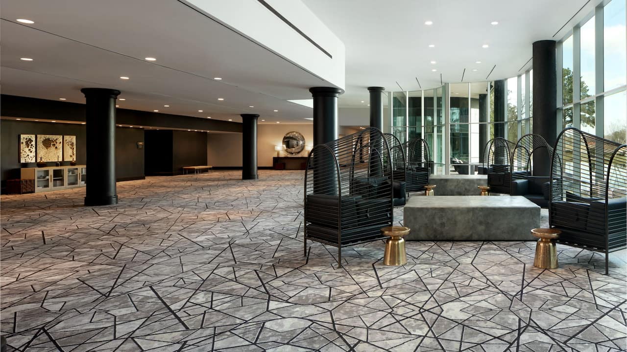 Water Court reception setup with floor-to-ceiling windows 