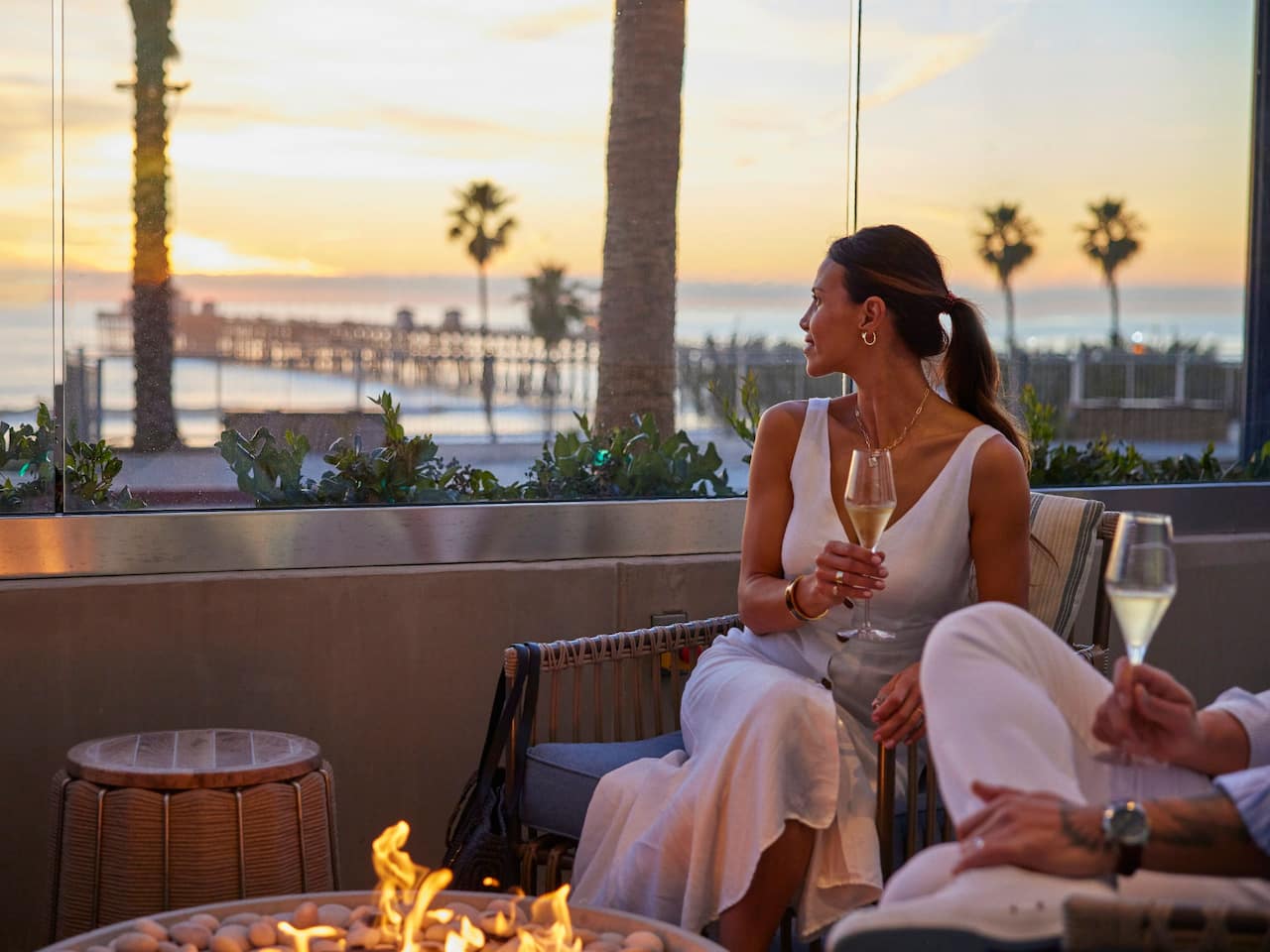 Woman Sitting in Shore Room Lounge Area
