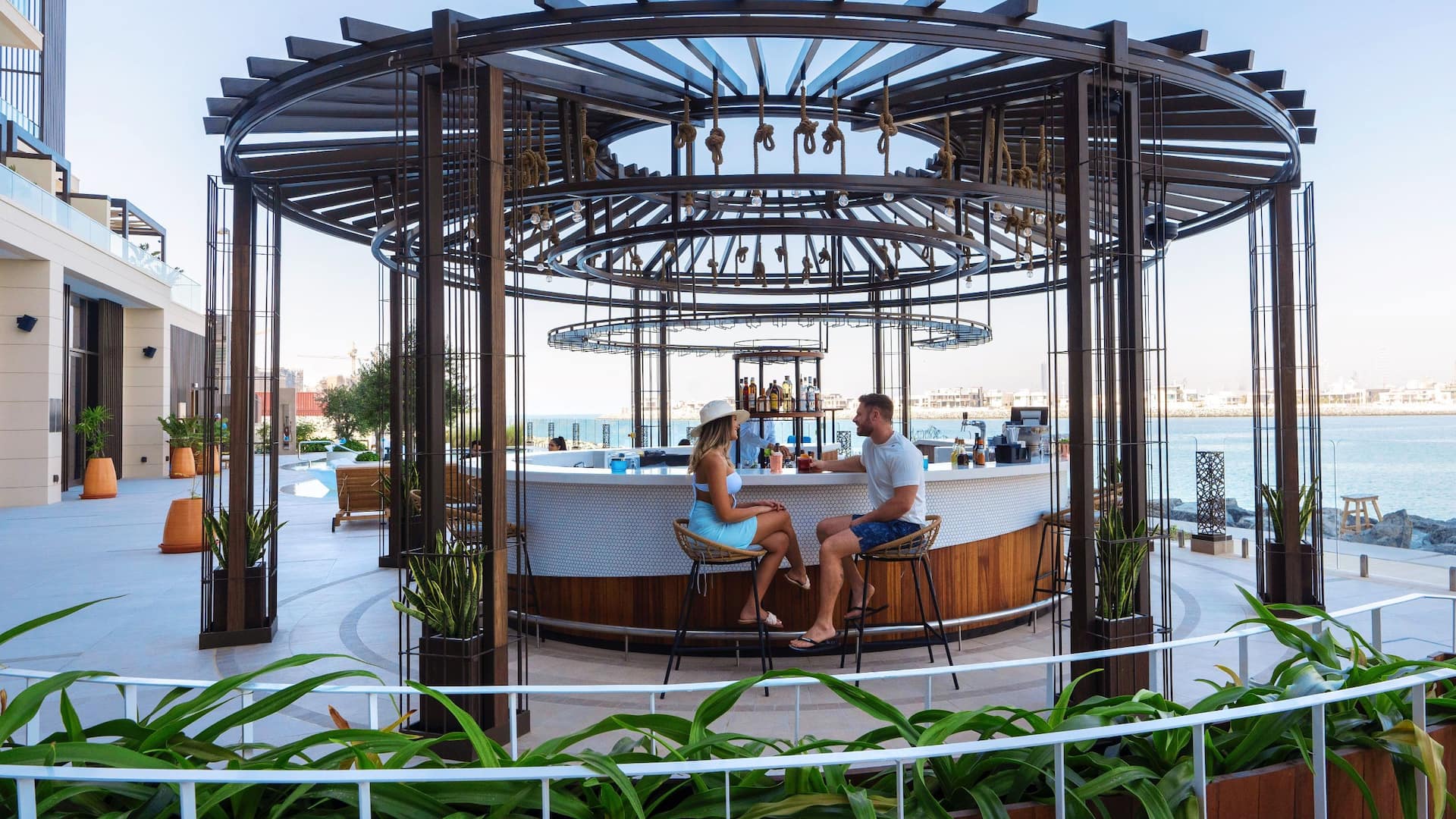 1 of 2 Sundowners at Hyatt Centric Jumeirah Dubai Lifestyle Hotel Pool Bar with sea views, offering best cocktails and BBQ in Dubai