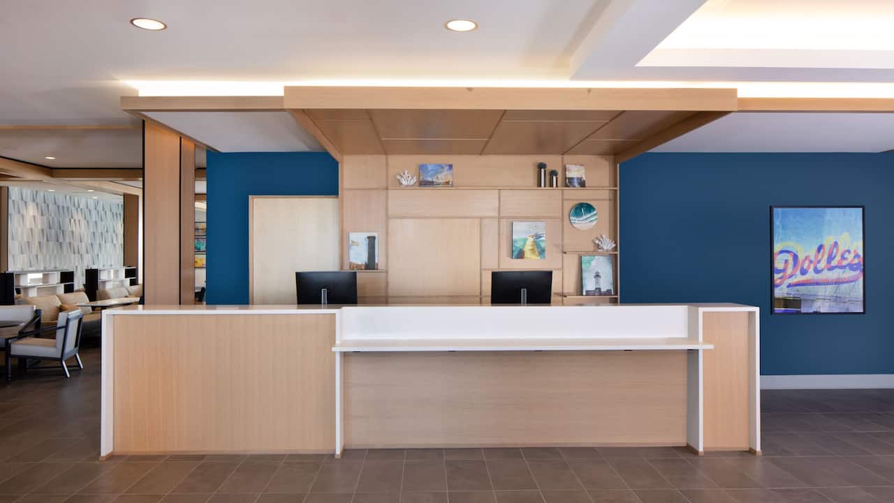 Hotel front desk located in lobby 