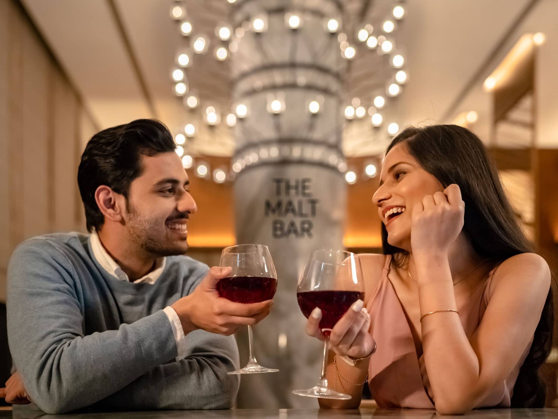 Hyatt Regency Dehradun Couple Enjoying Malt Bar Drinks