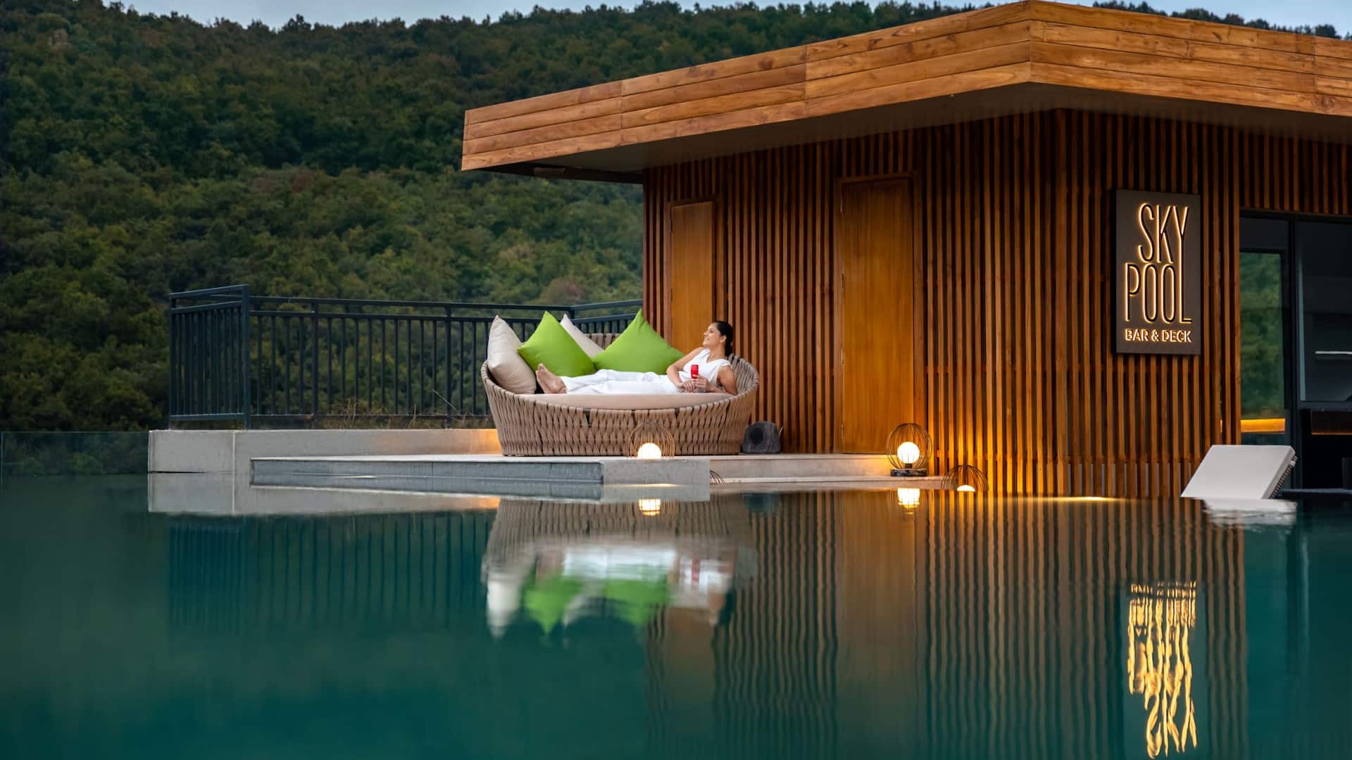 Hyatt Regency Dehradun Woman Pool View