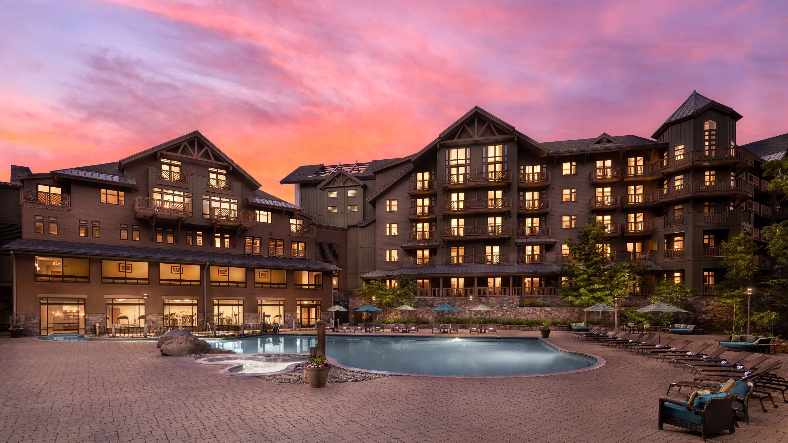 The Lodge at Spruce Peak Pool Dusk View