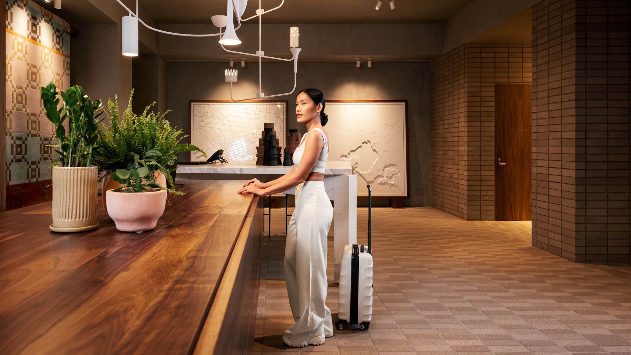 Hyatt Centric Melbourne Woman Front Desk Check-in