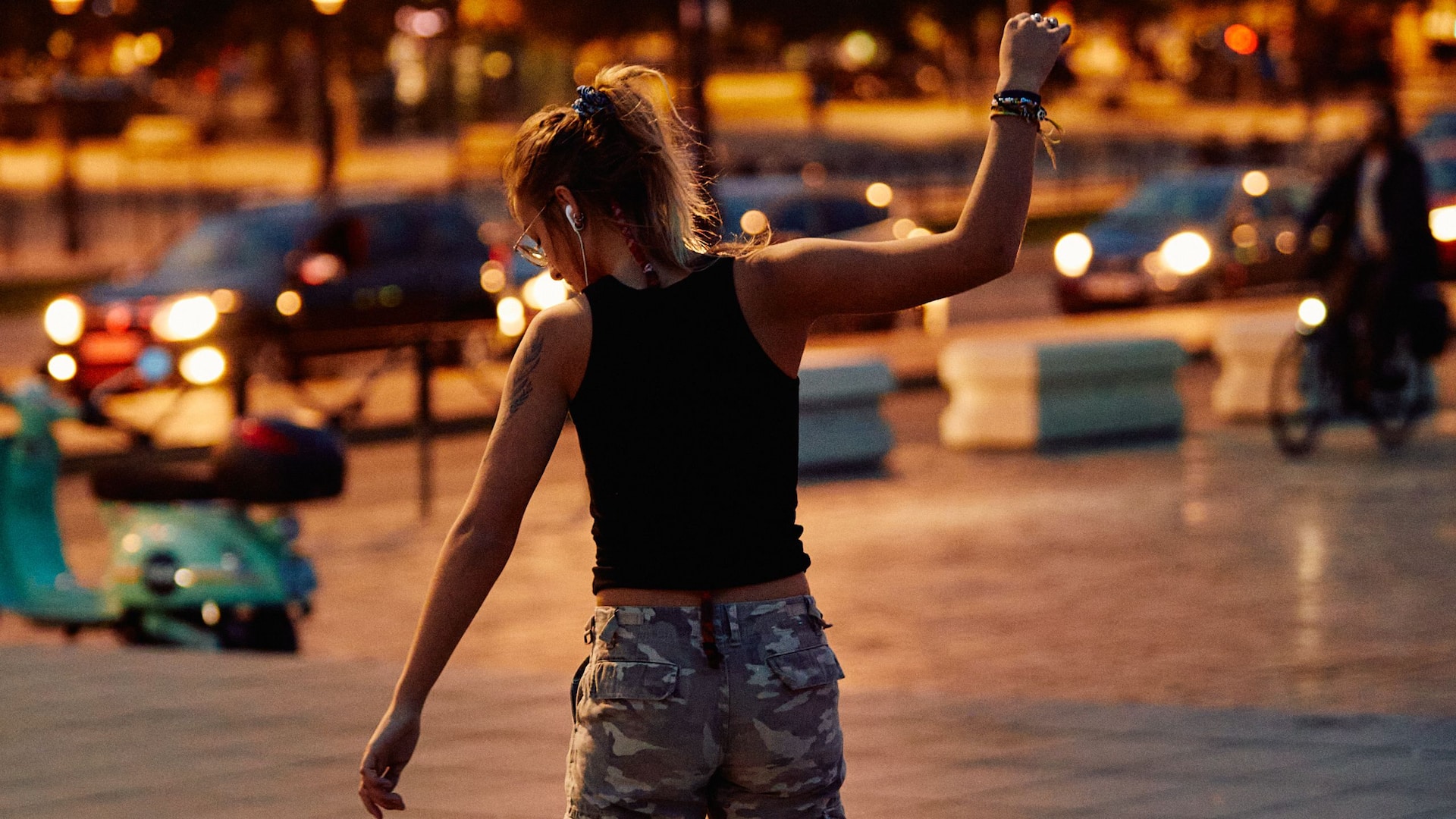 Woman skating in the evening