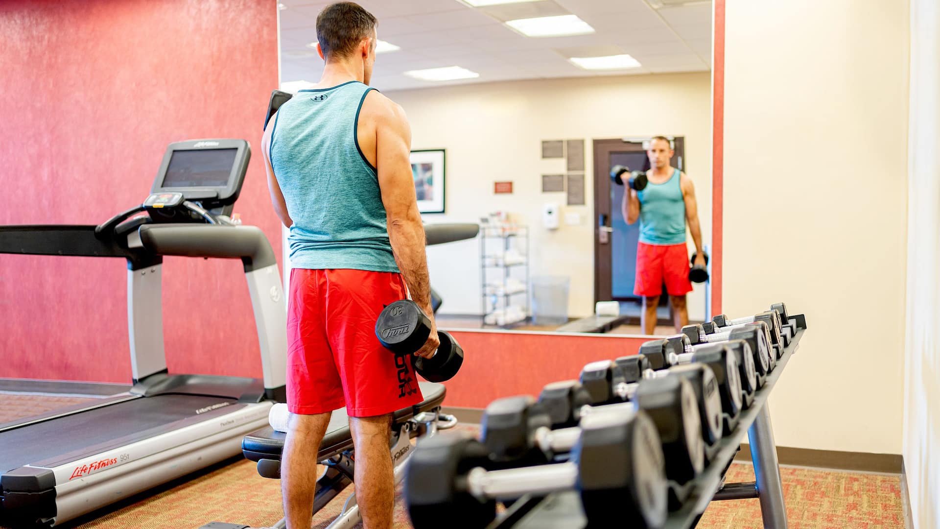 Hyatt Place Los Cabos Man Exercising In Fitness Center