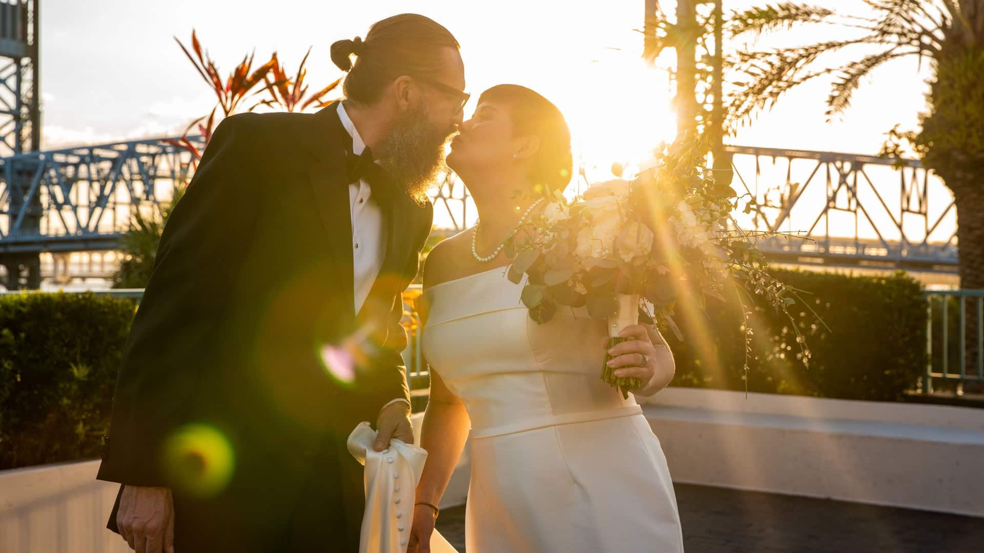 Hyatt Regency Jacksonville Riverfront River Deck Bride Groom Sunset Kiss