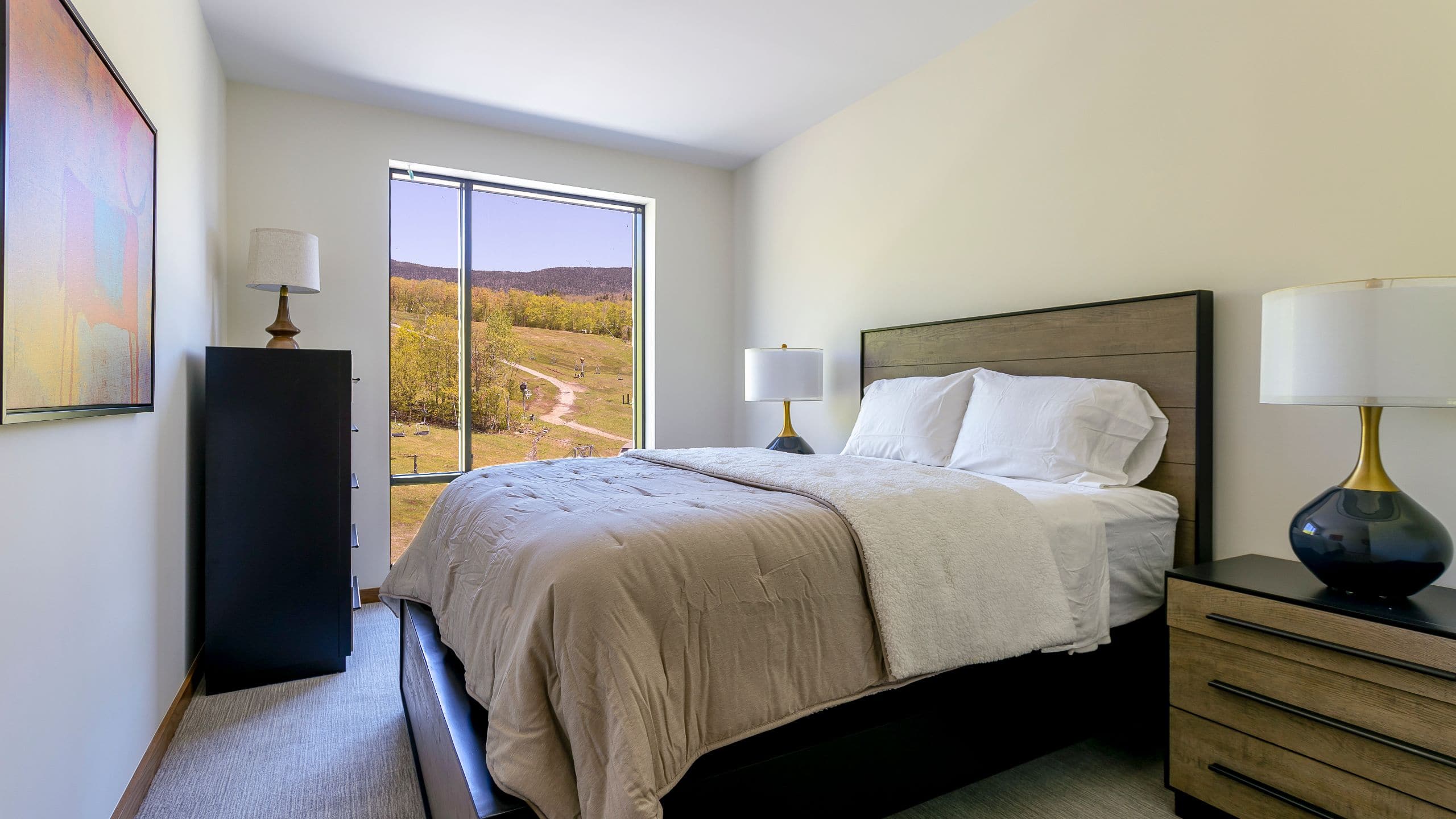 2 of 5 The Lodge at Spruce Peak Guestroom Bed