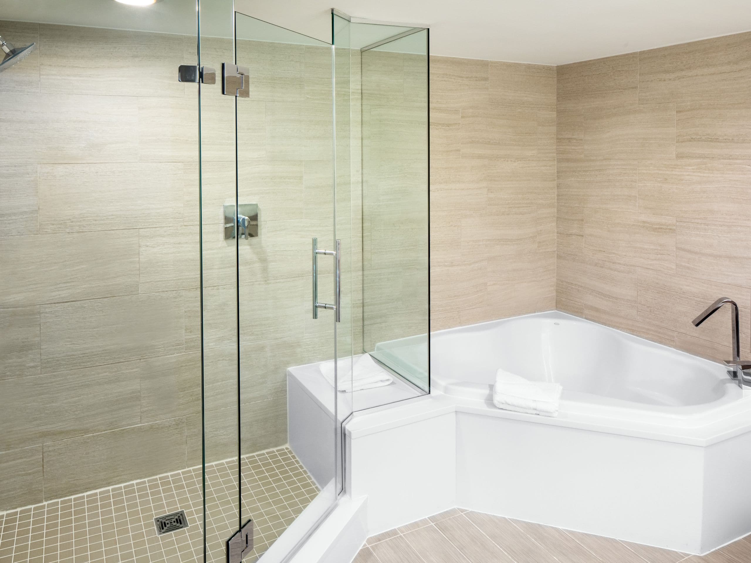 Presidential Suite bathroom with large soaking tub and separate shower