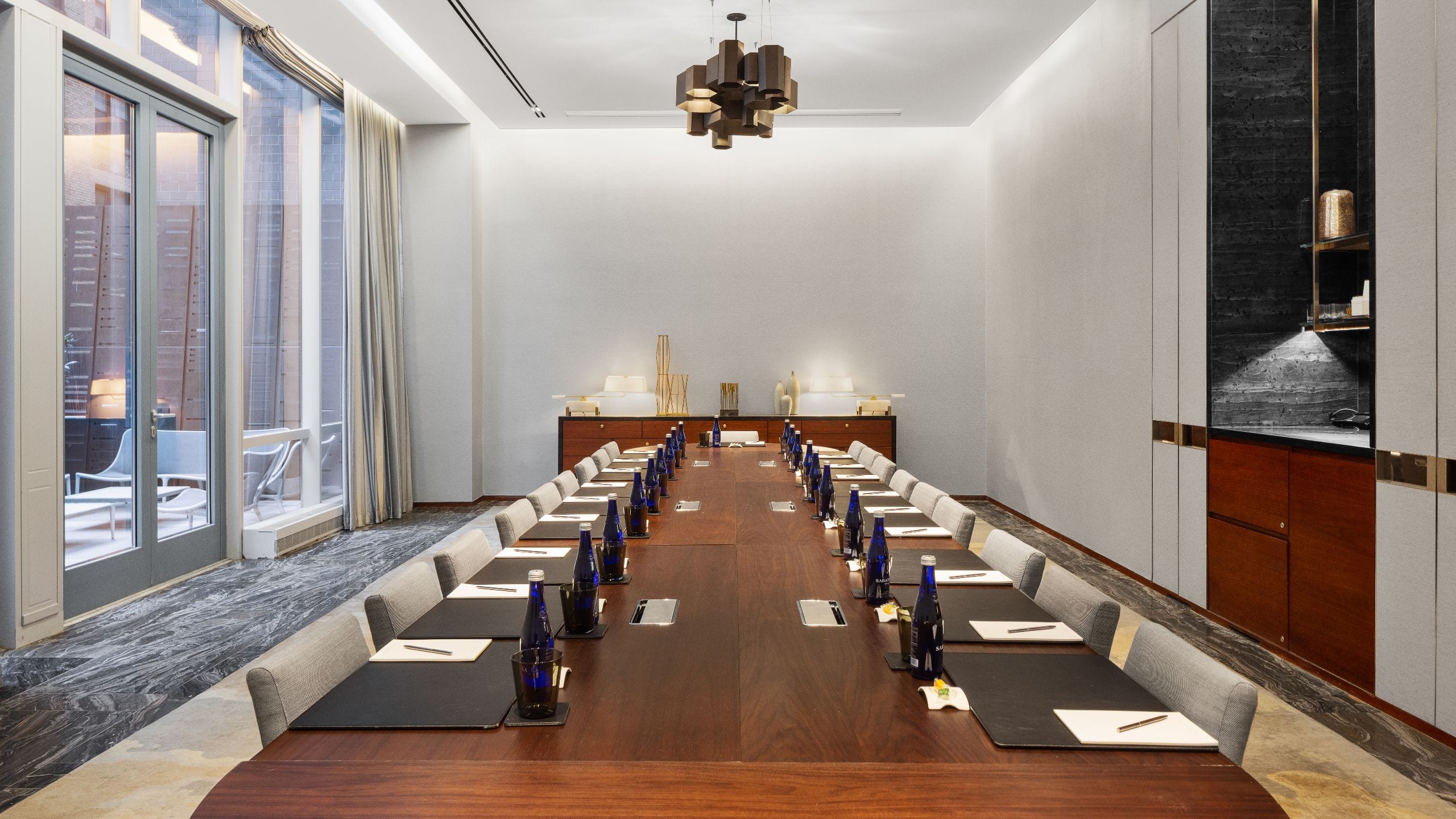 Long conference room table and chairs