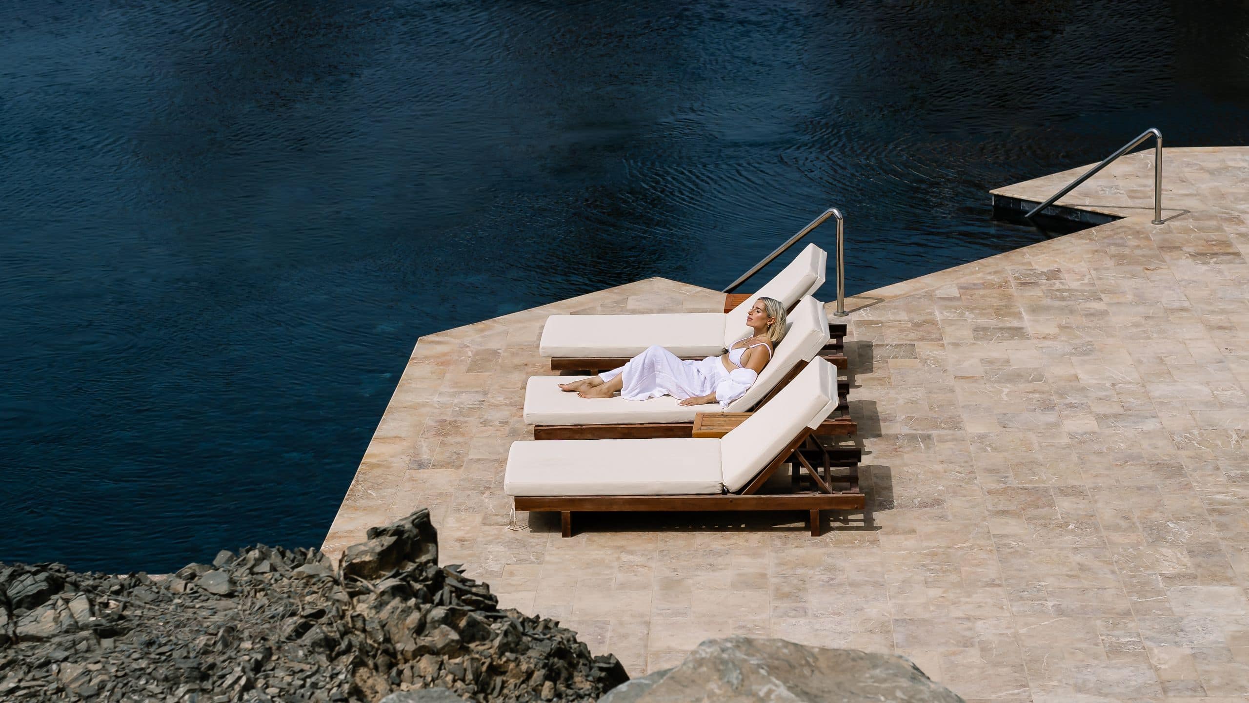 Alila Hinu Bay Woman Poolside Deck Chair