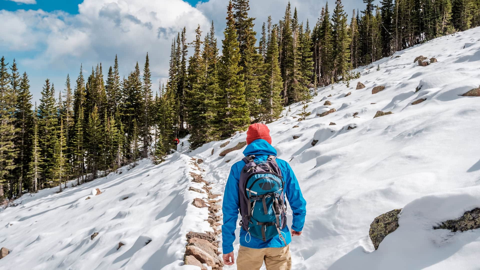 Hyatt Regency Denver at Colorado Convention Center Man Hiking Snowy Trail