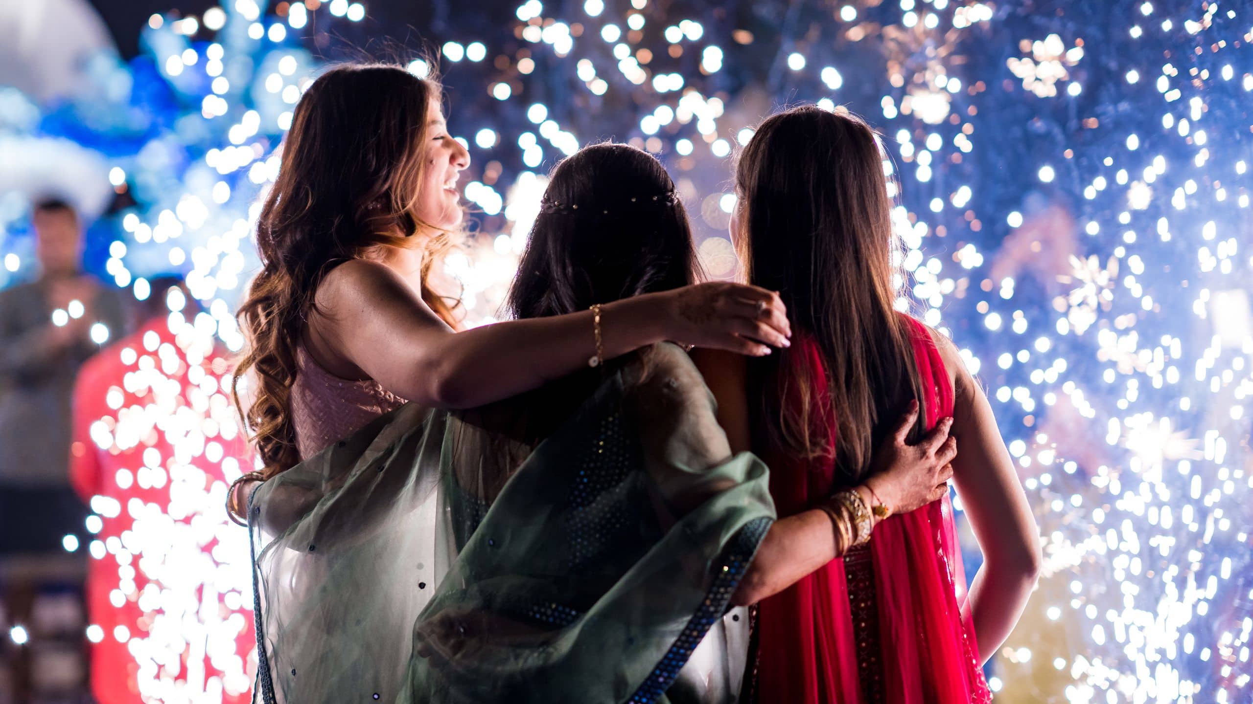 Hyatt Regency Ahmedabad Indian Wedding Dance Women Hug