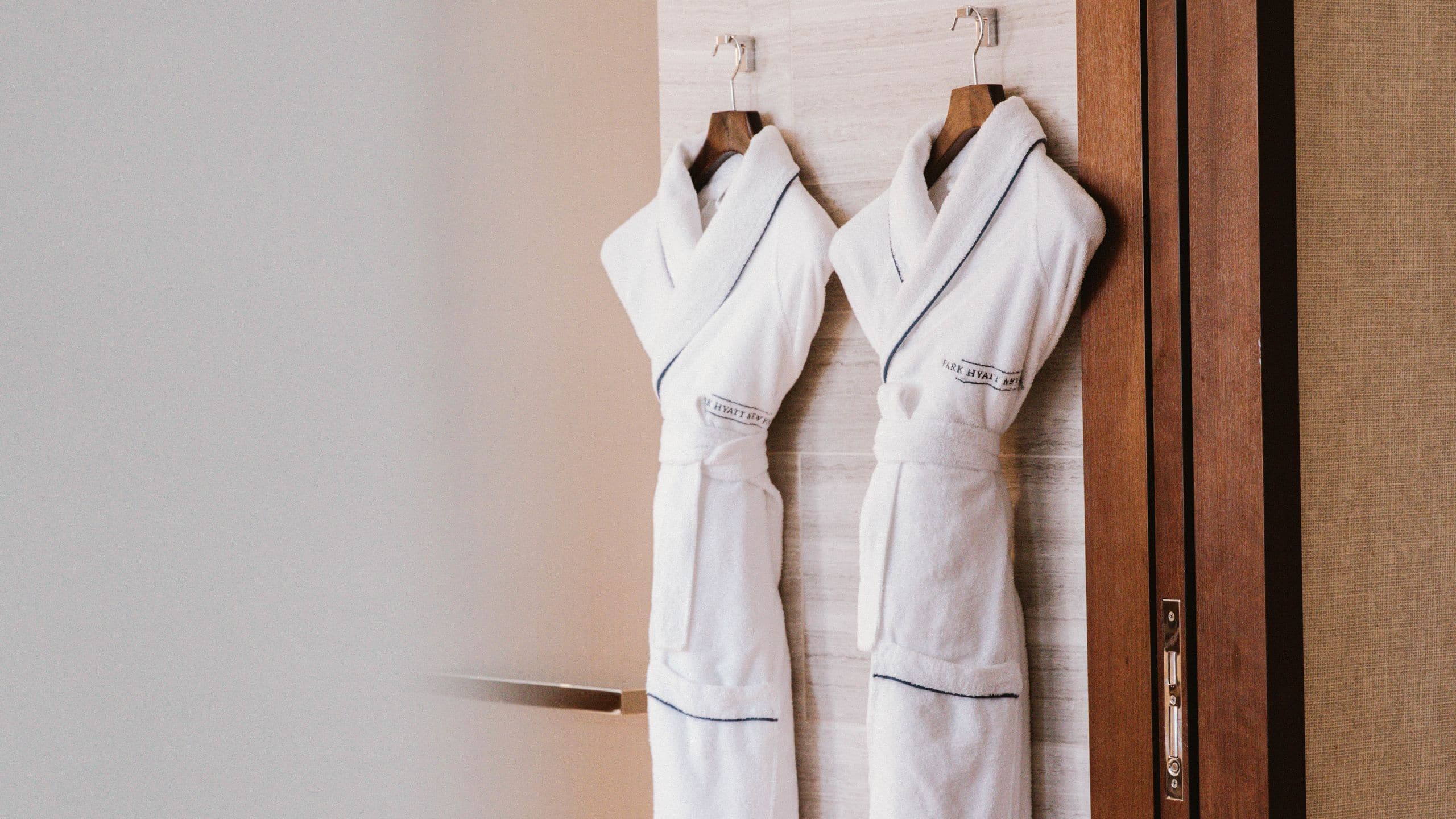 Bathrobes hanging in a bathroom in New York City