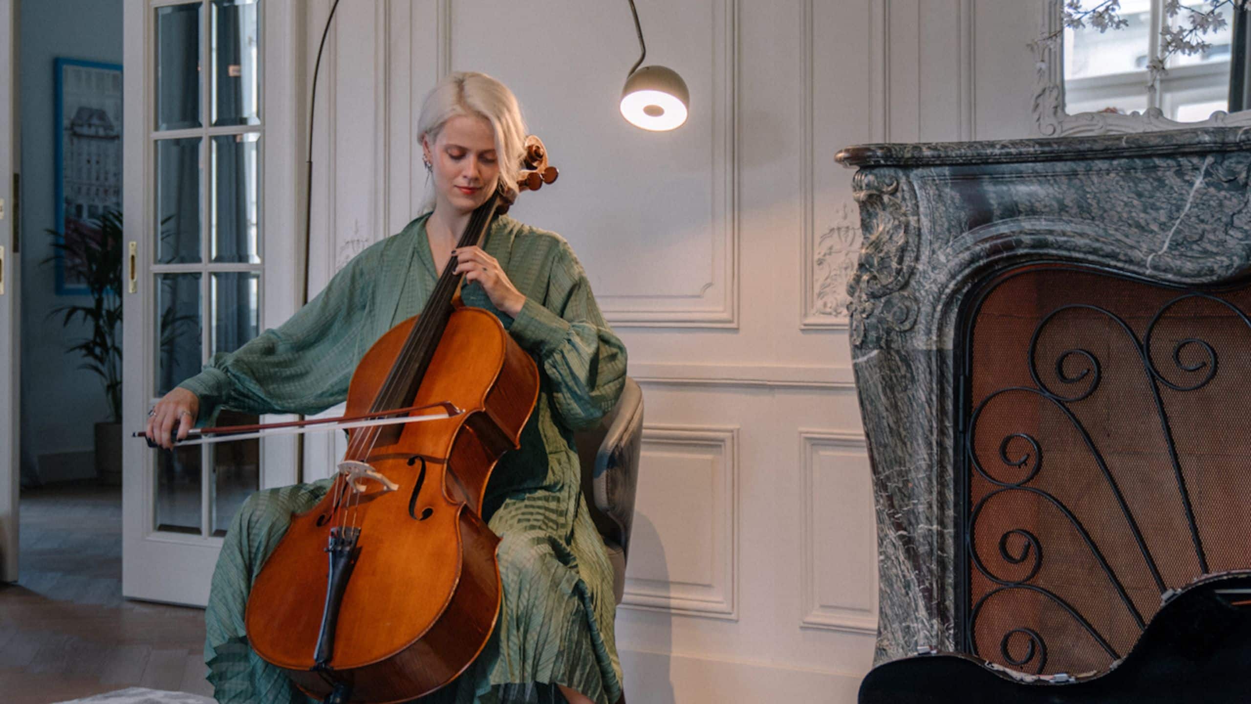 Andaz Prague Sugar Palace Suite Woman Playing Cello