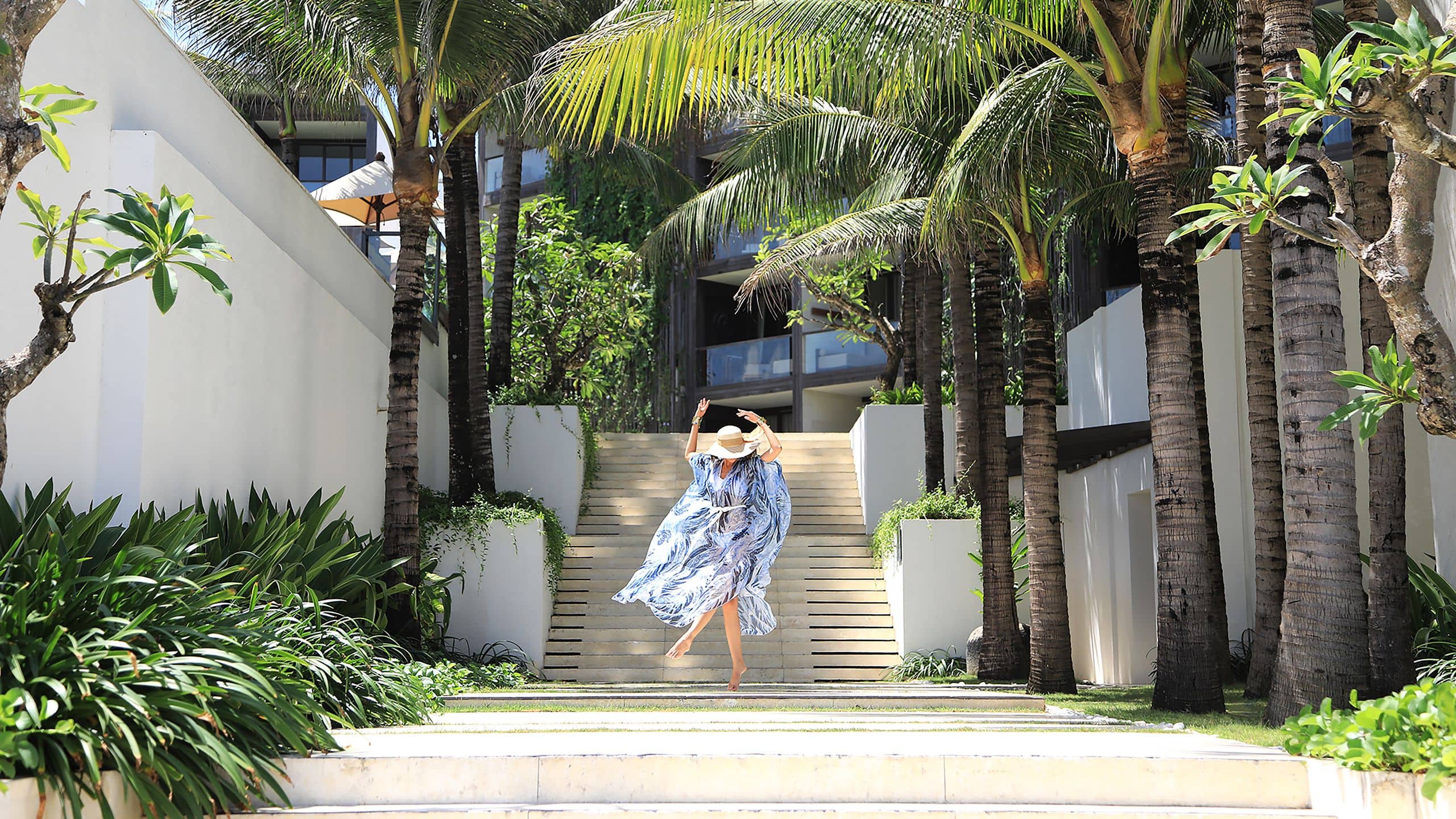 Alila Seminyak Woman On Stairs