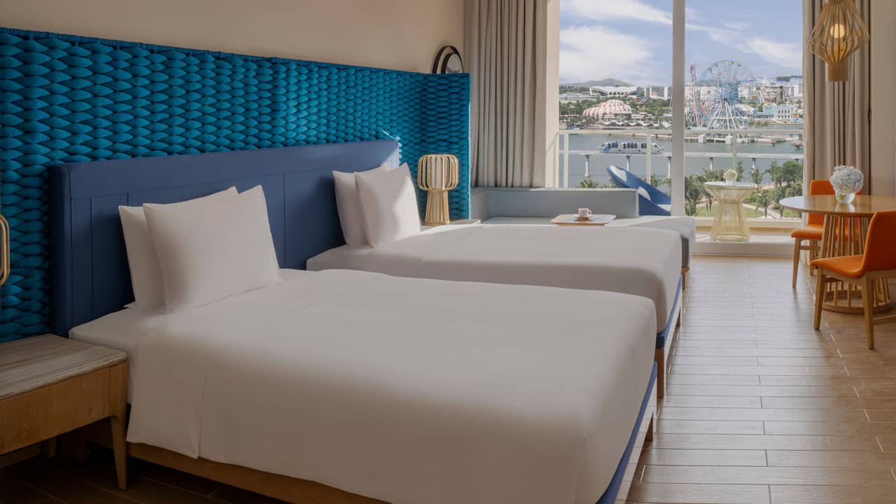 Twin Beds With Theme Park View