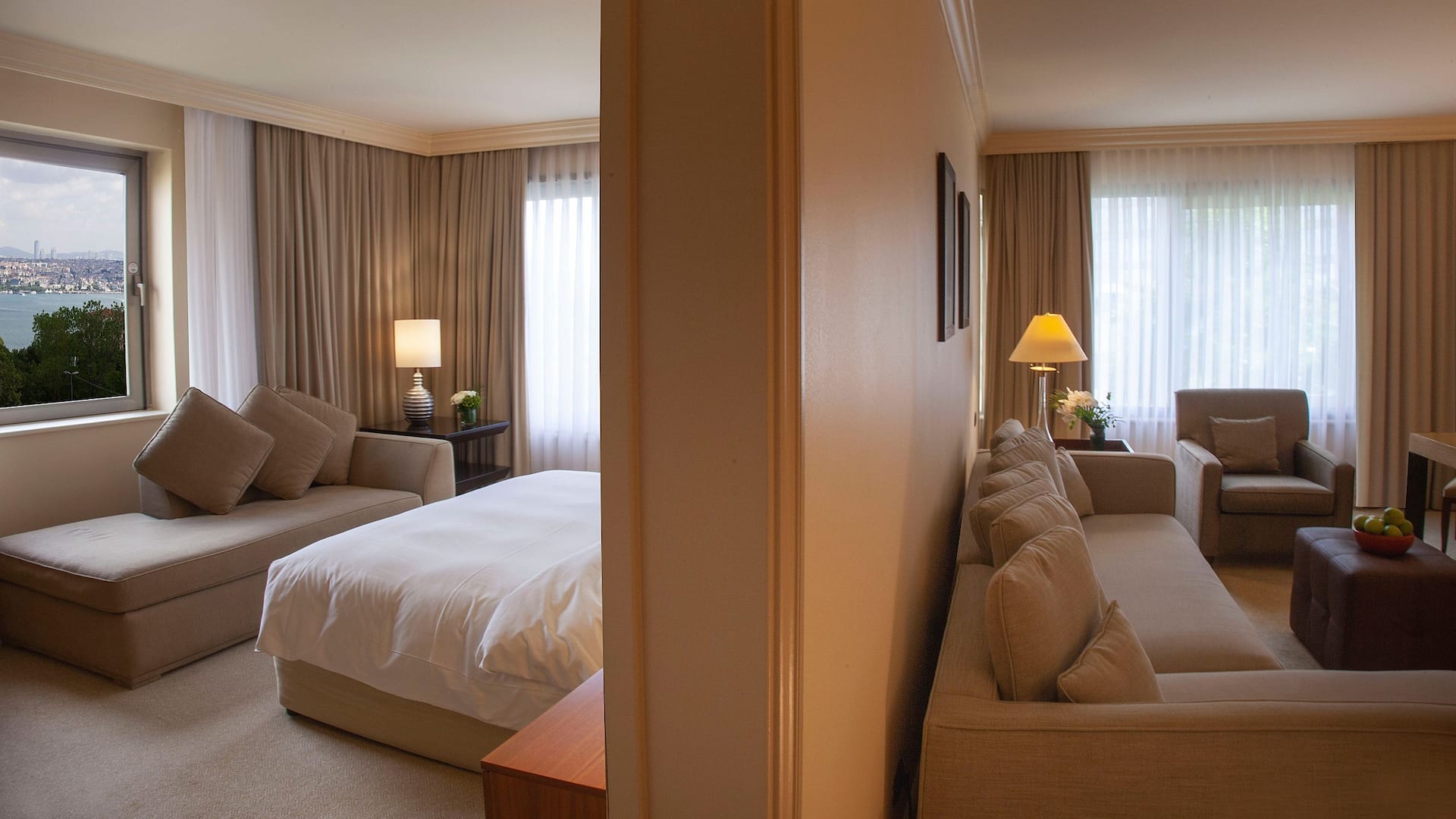 Grand Suite King sea view at Grand Hyatt Istanbul, showing living room and bedroom with soft-colored decor and sea view.