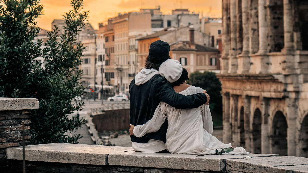 Couple Hugging Colosseum