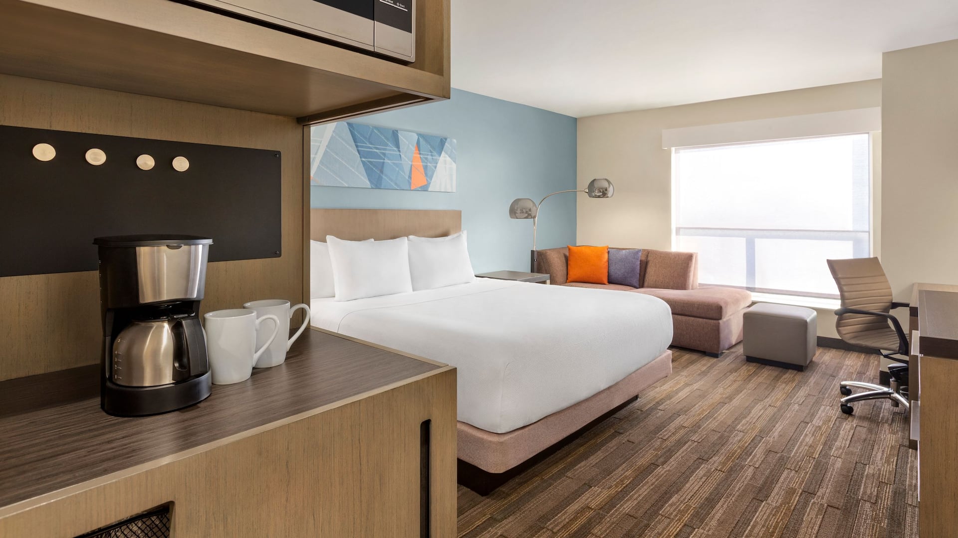 1 of 3 Hyatt House Bryan / College Station Den Guestroom 1 King Bed