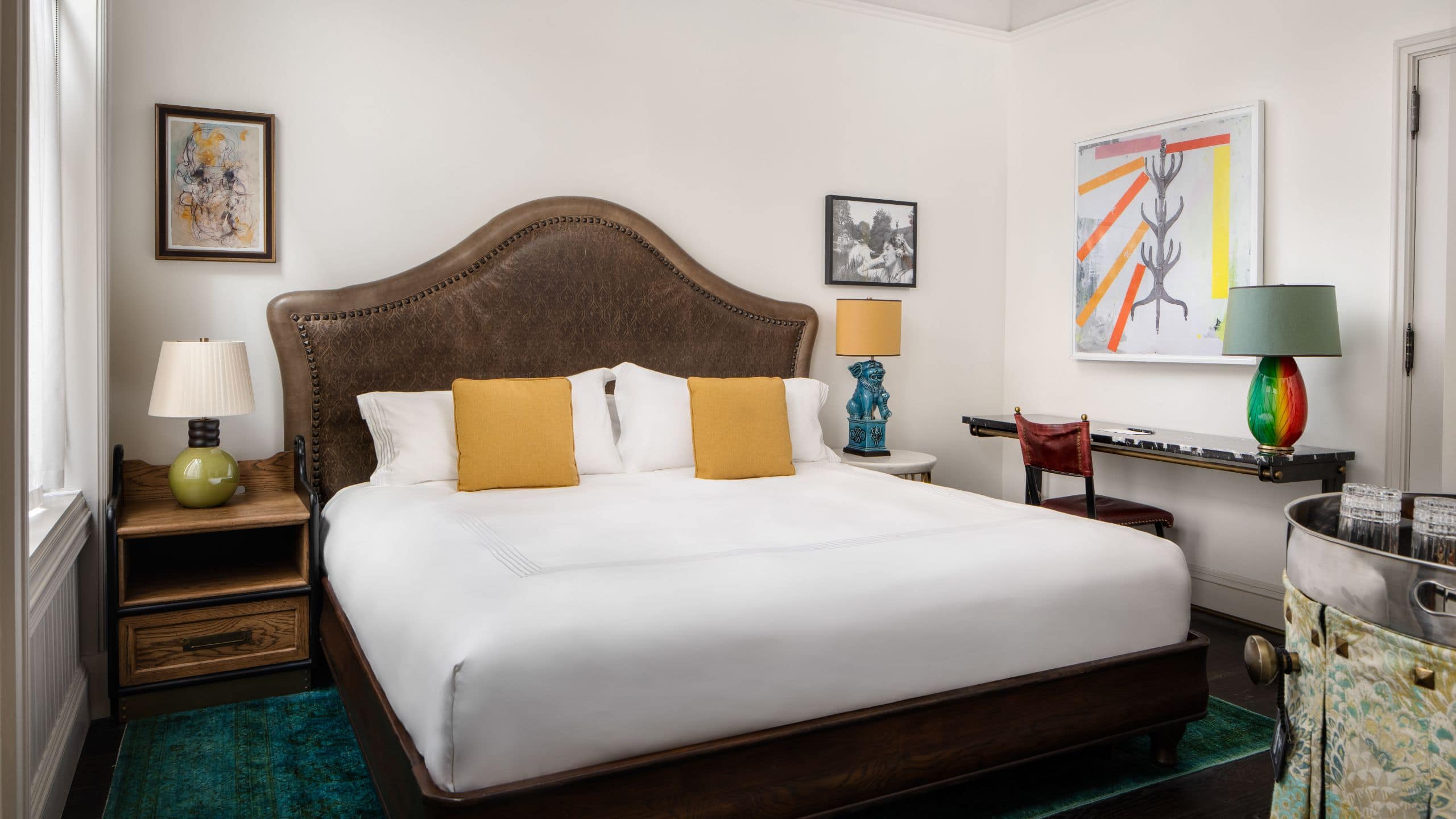 King bed with writing desk and three lamps