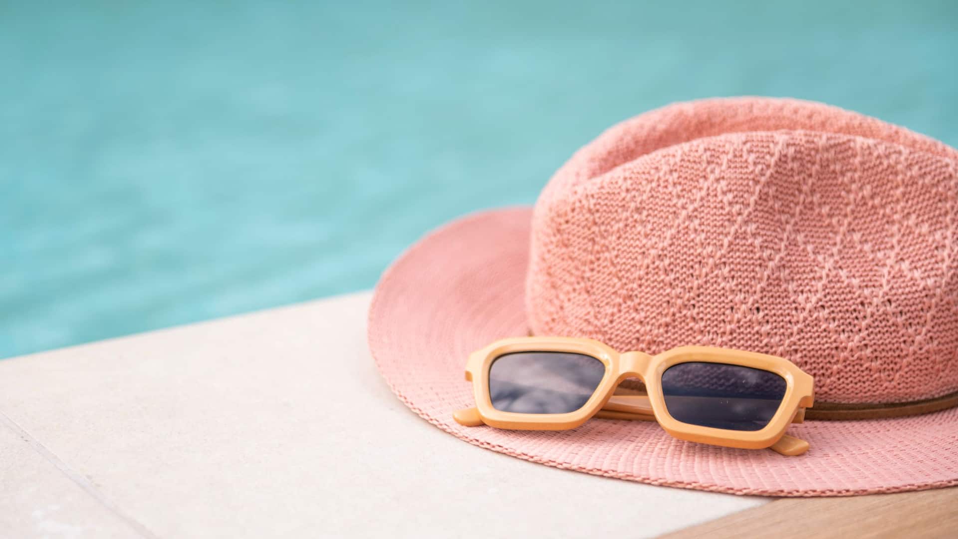 Hyatt Regency Barcelona Tower Sun Hat Sunglasses Sunset Poolside