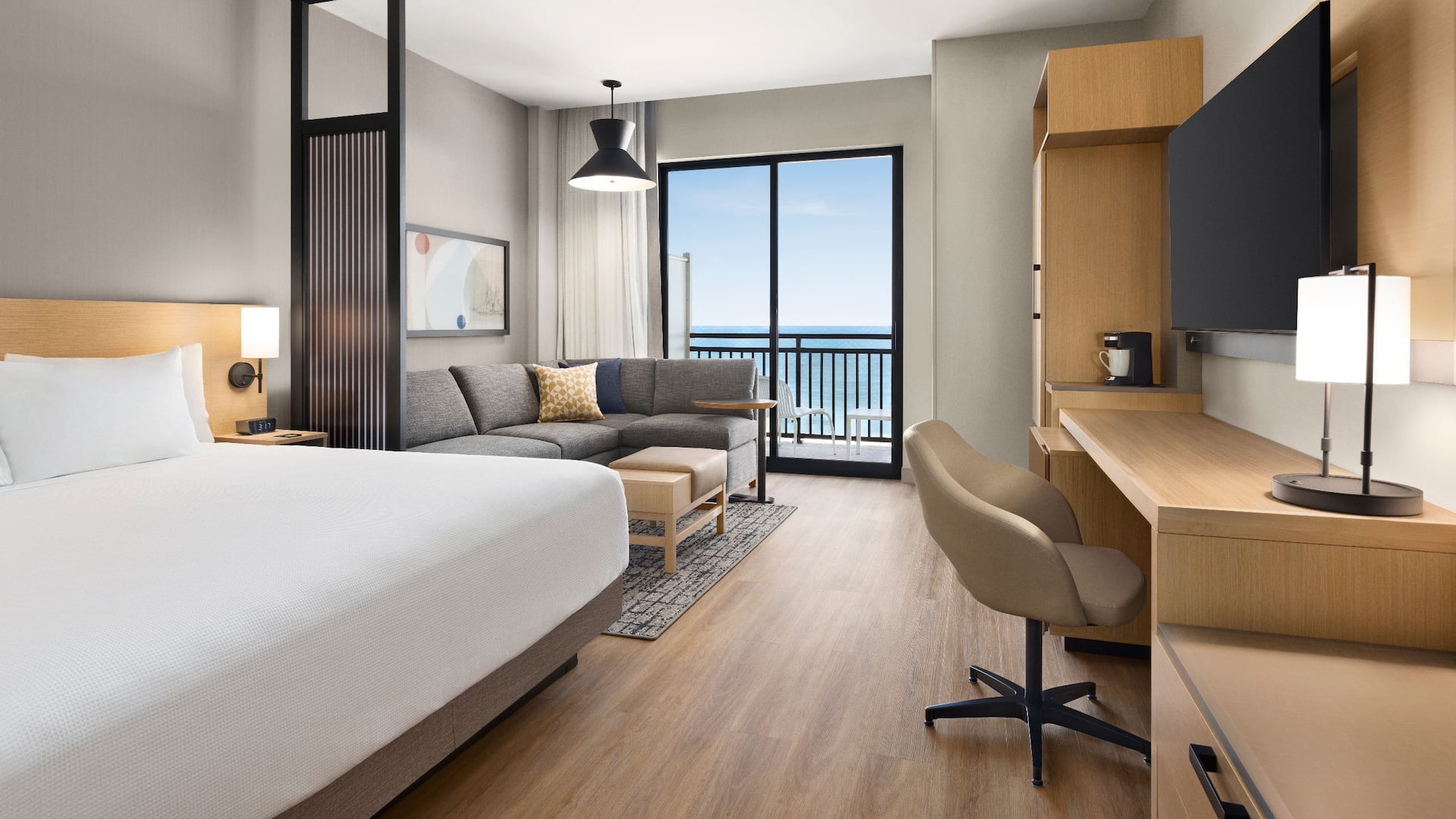 Hyatt Place Virginia Beach / Oceanfront  Oceanfront King Guestroom Bed Couch