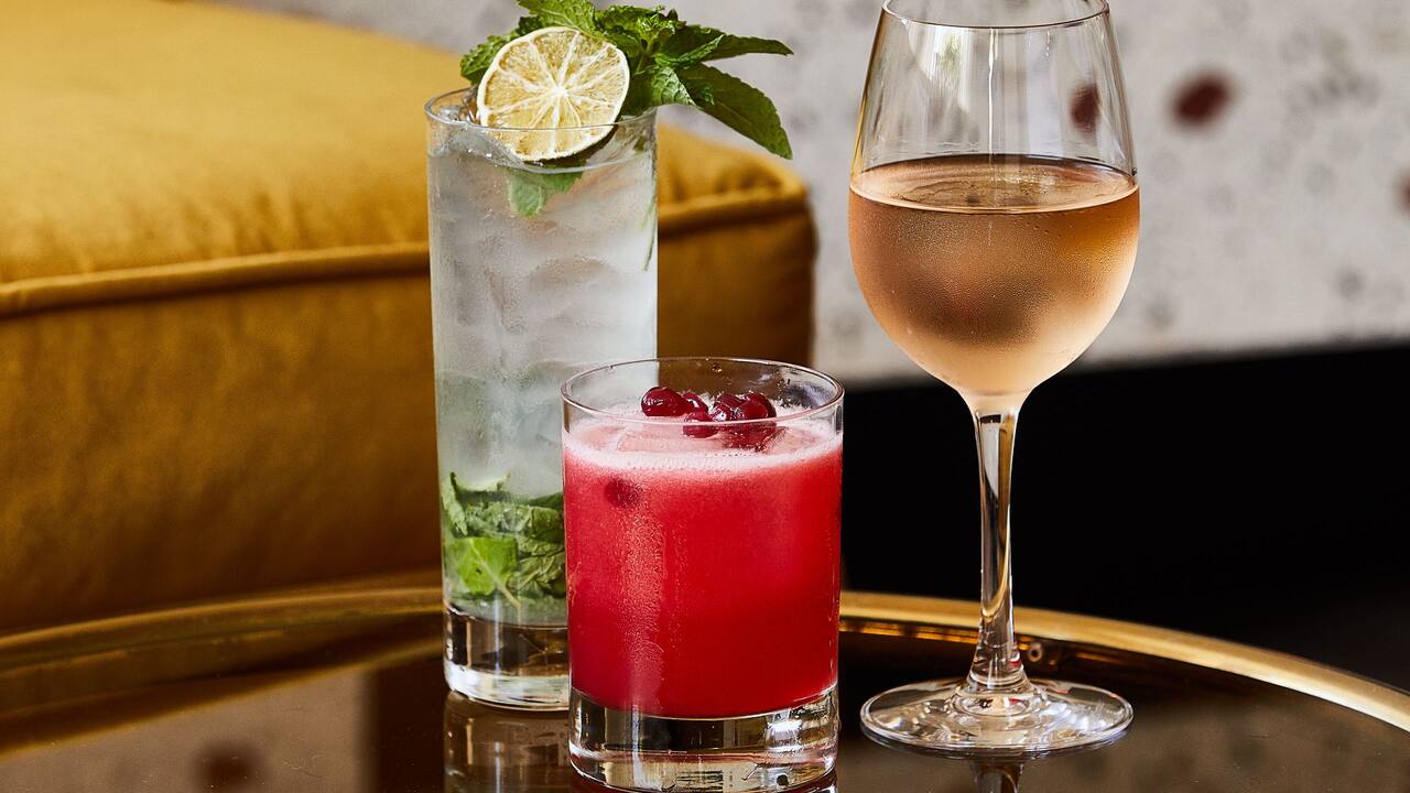 Laureate cocktails by lobby fire